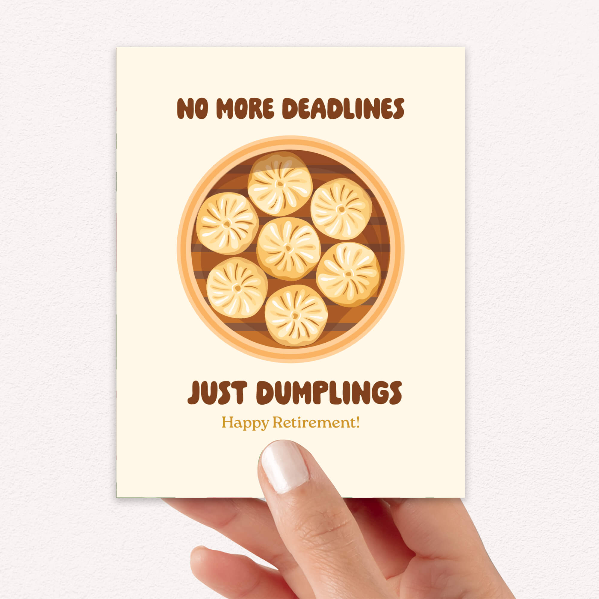 Greeting card with dumplings and humorous retirement message held by a hand.