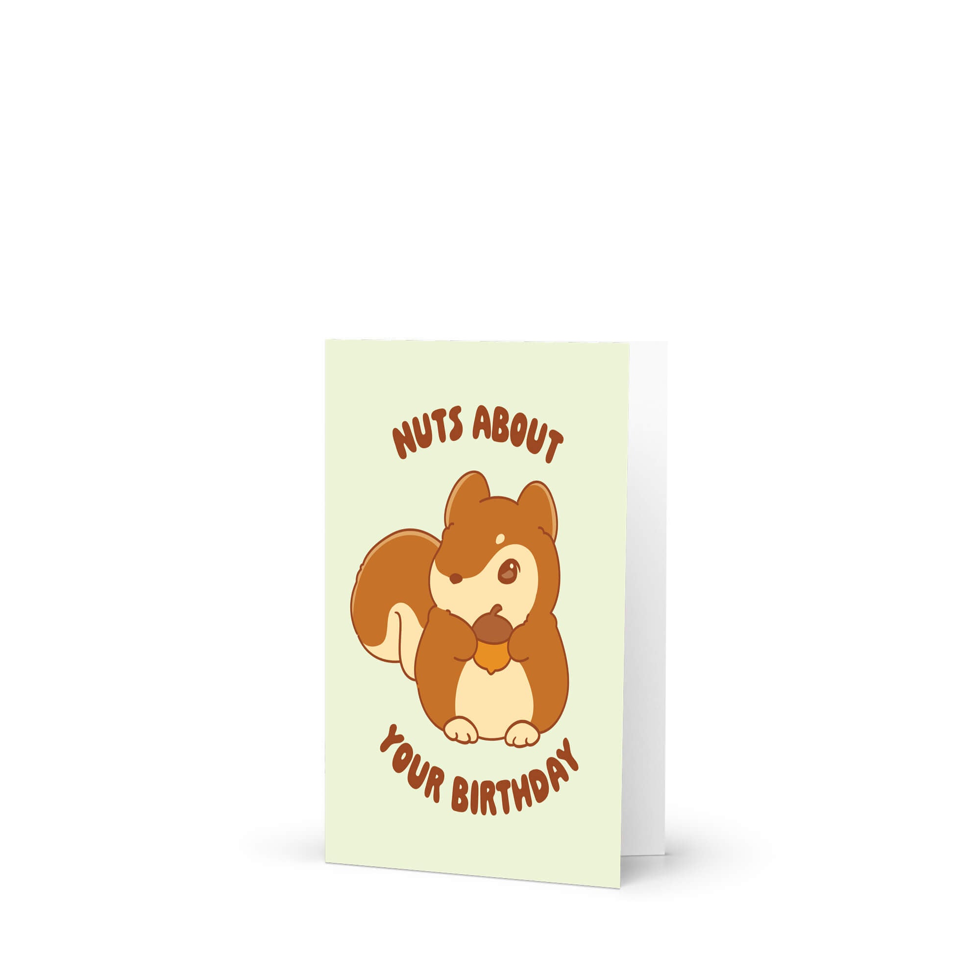 Greeting card with a cartoon squirrel and 'Nuts About Your Birthday' text on a light green background