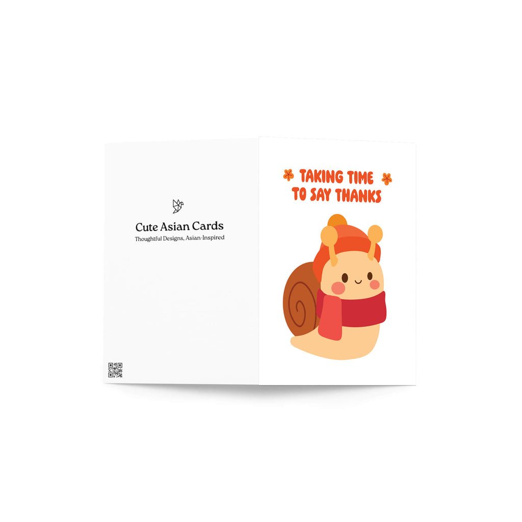 fall Card with a cartoon snail wearing a scarf and text 'Taking time to say thanks' on a white background.