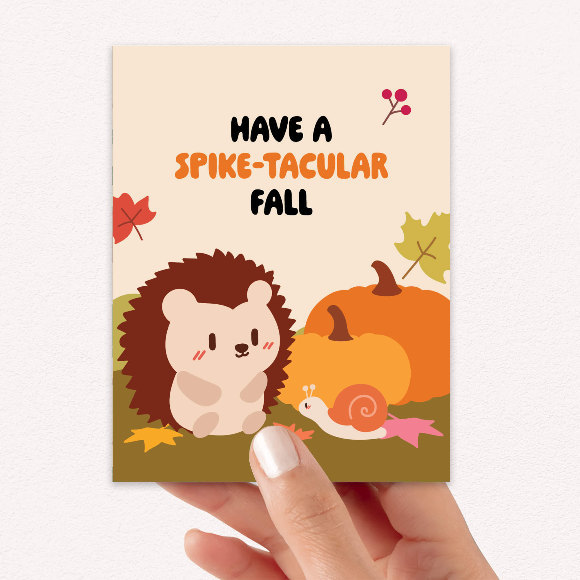 autumn Card with hedgehog, pumpkin, and snail illustration and 'Have a Spike-tacular Fall' text.