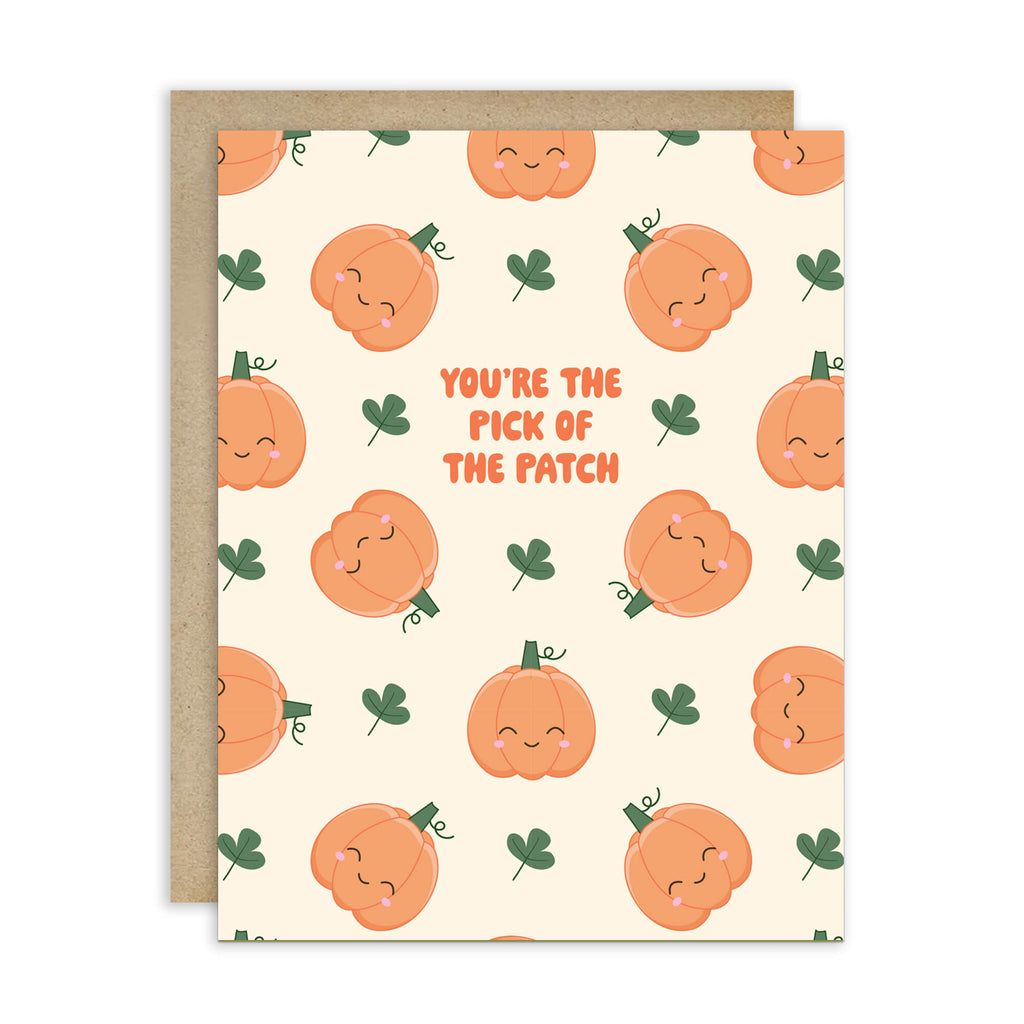 fall Greeting card with pumpkins and shamrocks on a beige background