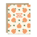 fall Greeting card with pumpkins and shamrocks on a beige background