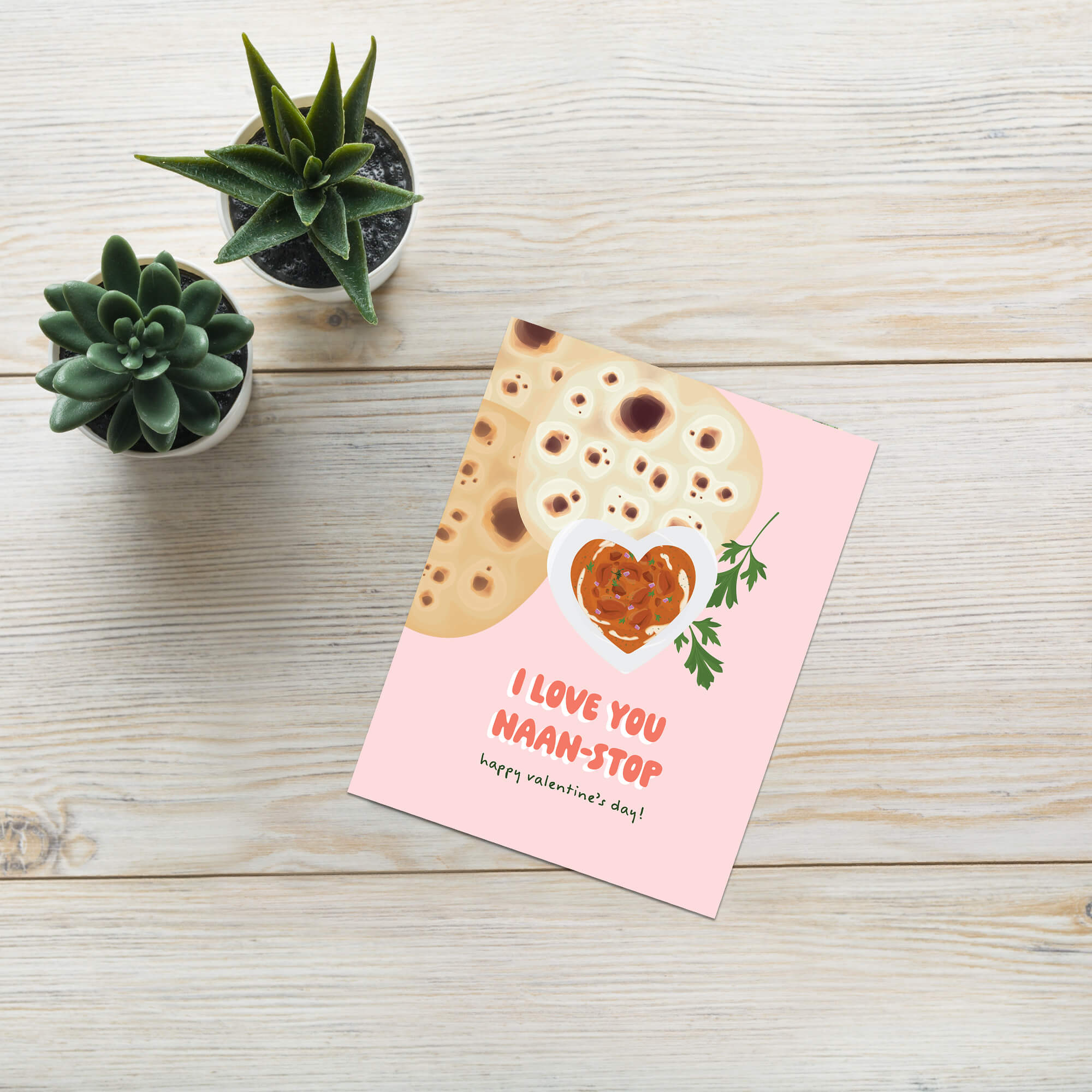 valentines day card with indian food and Naan bread with heart bowl of curry; text “I love you naan-stop — Happy Valentine’s Day.”