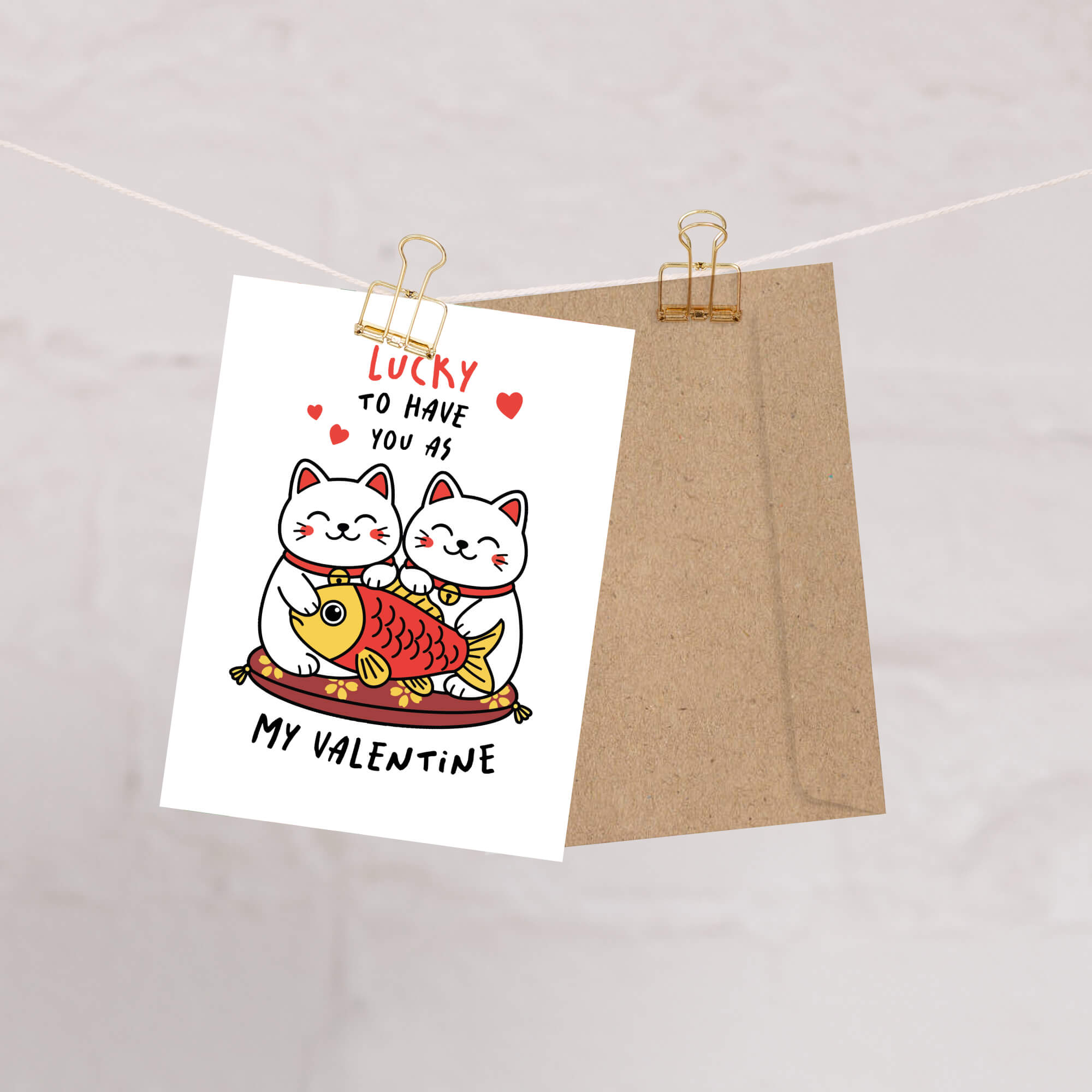 Valentine's Day card with two lucky maneki neko cats and a fish illustration, text 'Lucky to have you as my Valentine'.
