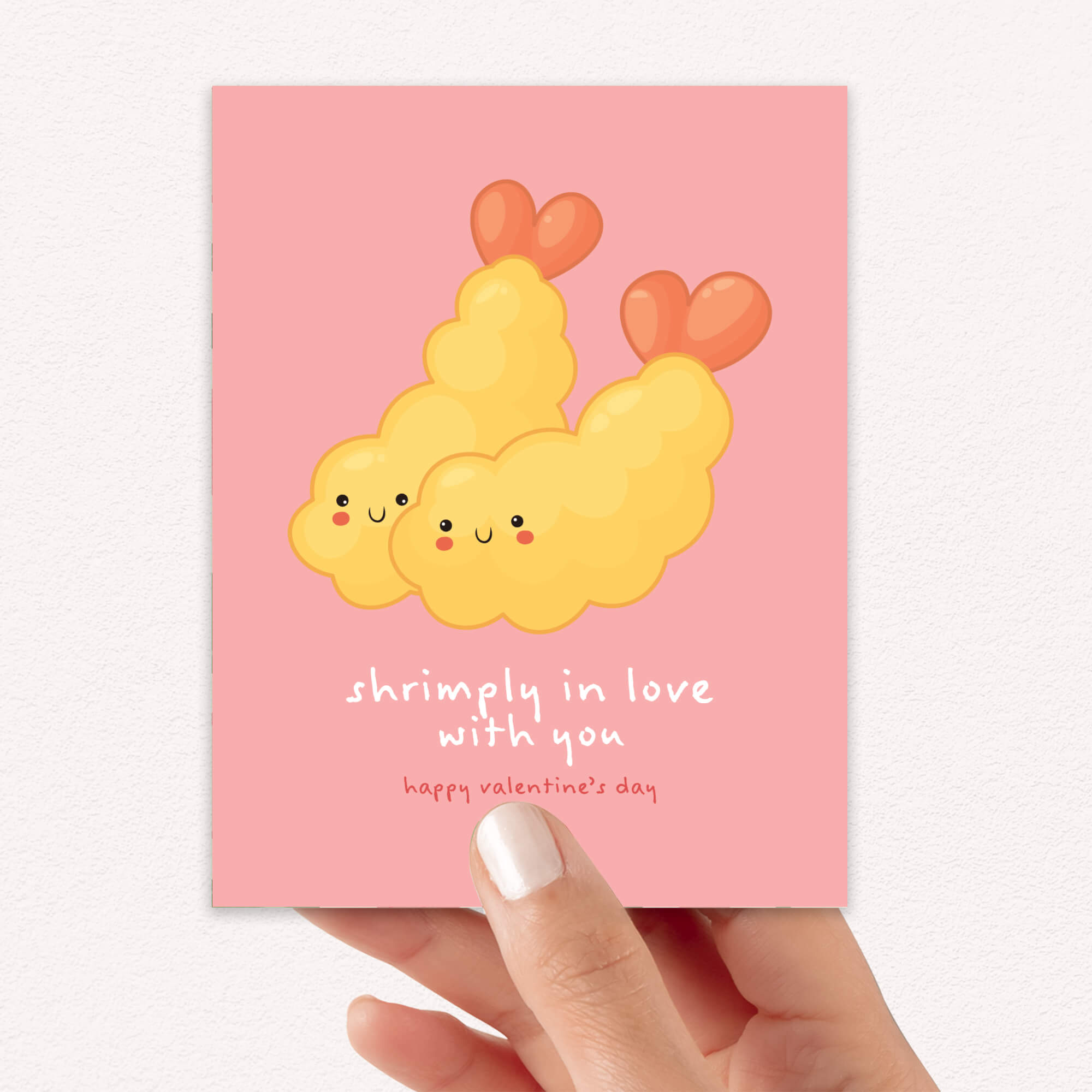 Valentine's Day card with Heart-shaped tempura shrimp on blush pink with “shrimply in love with you.”