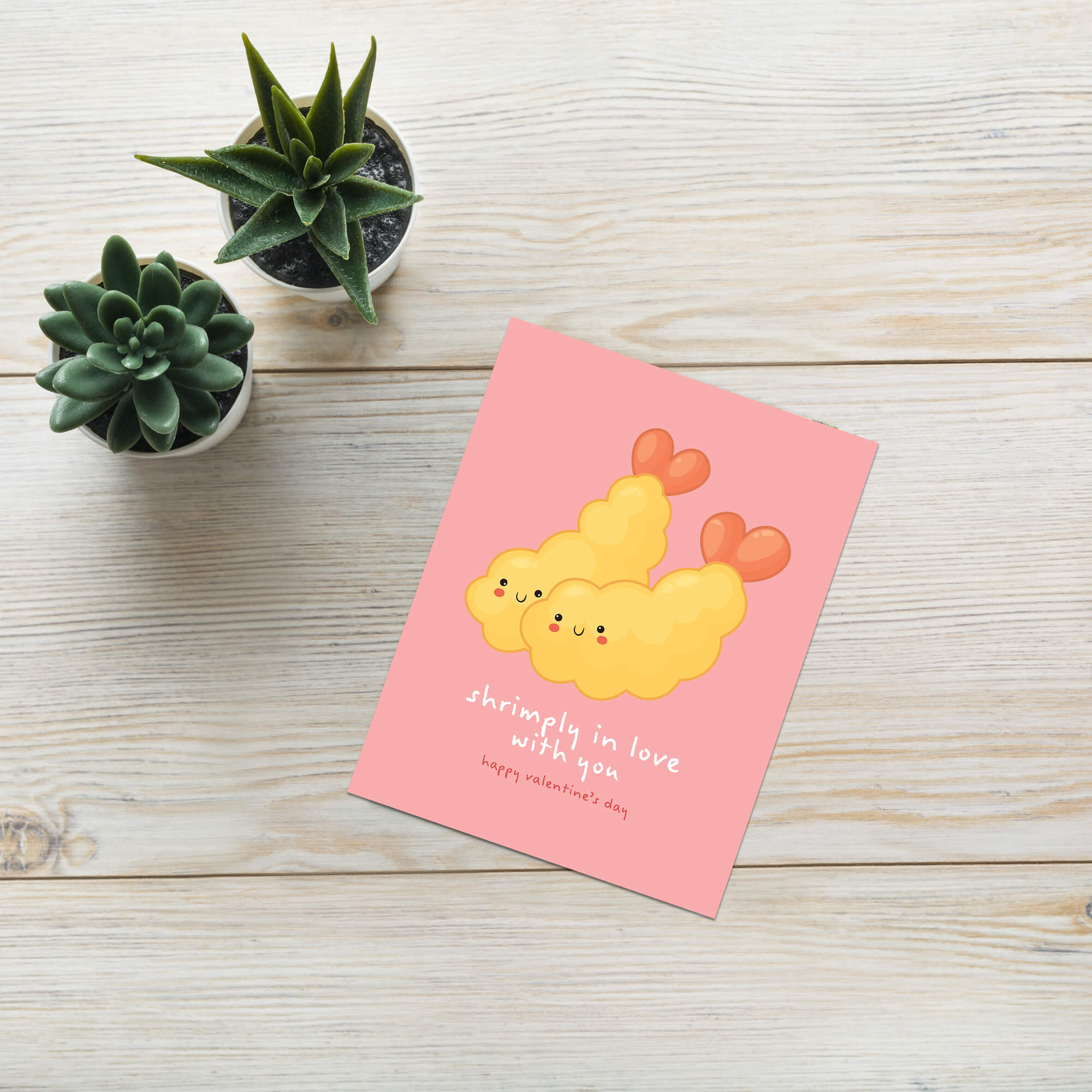 Valentine's Day card with Heart-shaped tempura shrimp on blush pink with “shrimply in love with you.”