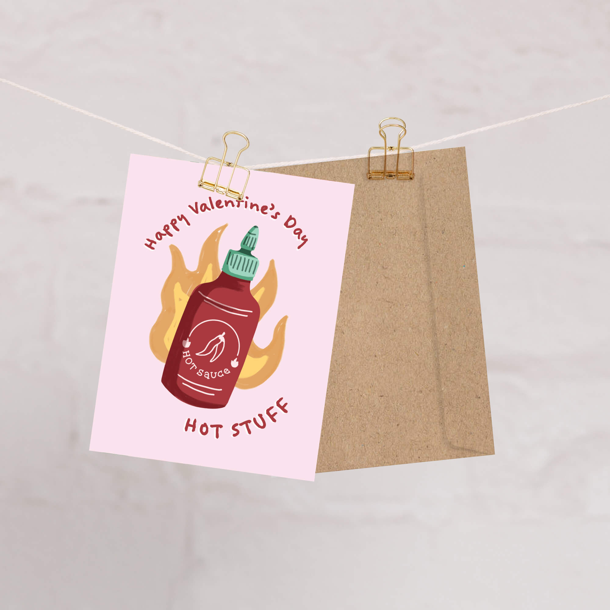 Red chili sauce bottle with flames; curved text “Happy Valentine’s Day — hot stuff.”
