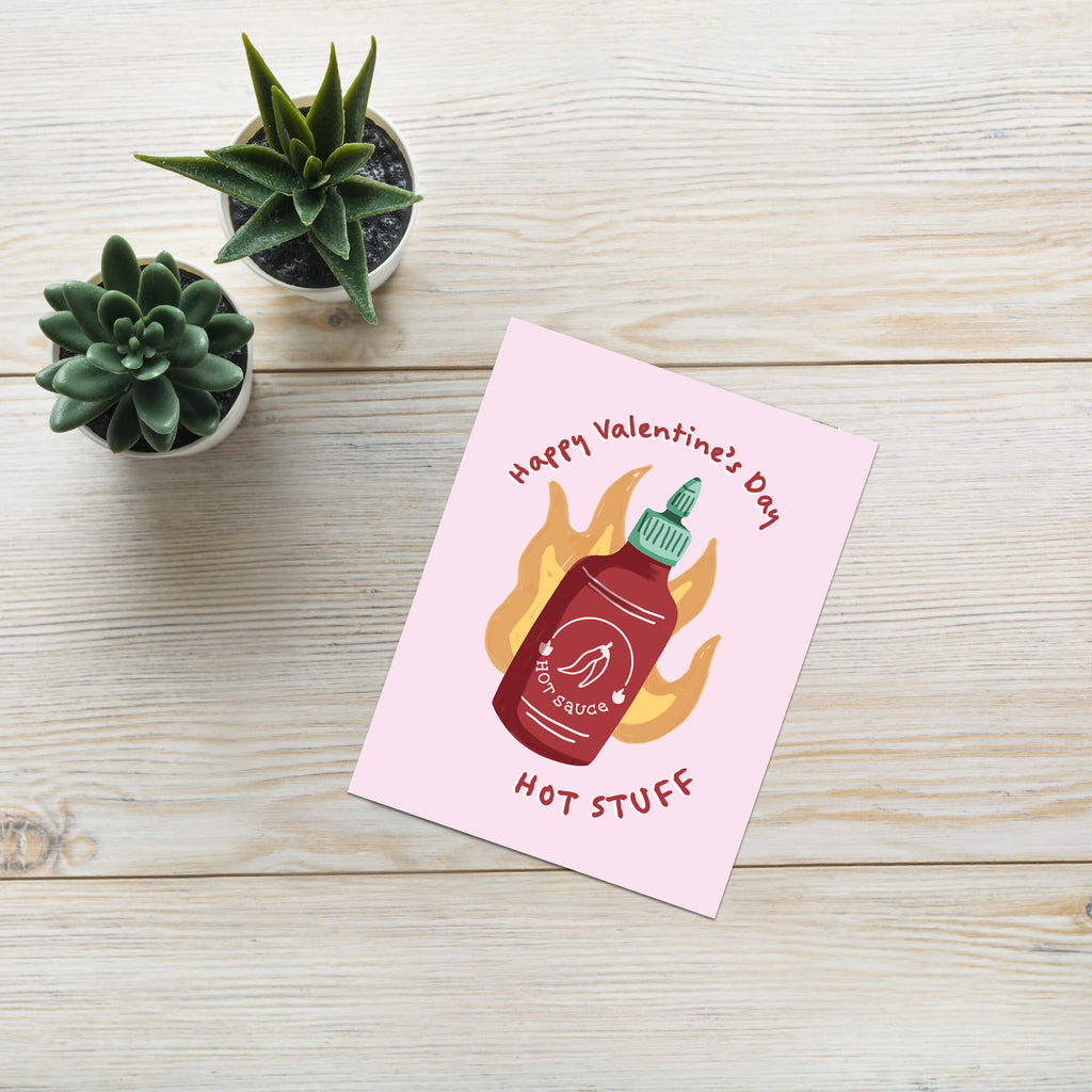 Red chili sauce bottle with flames; curved text “Happy Valentine’s Day — hot stuff.”