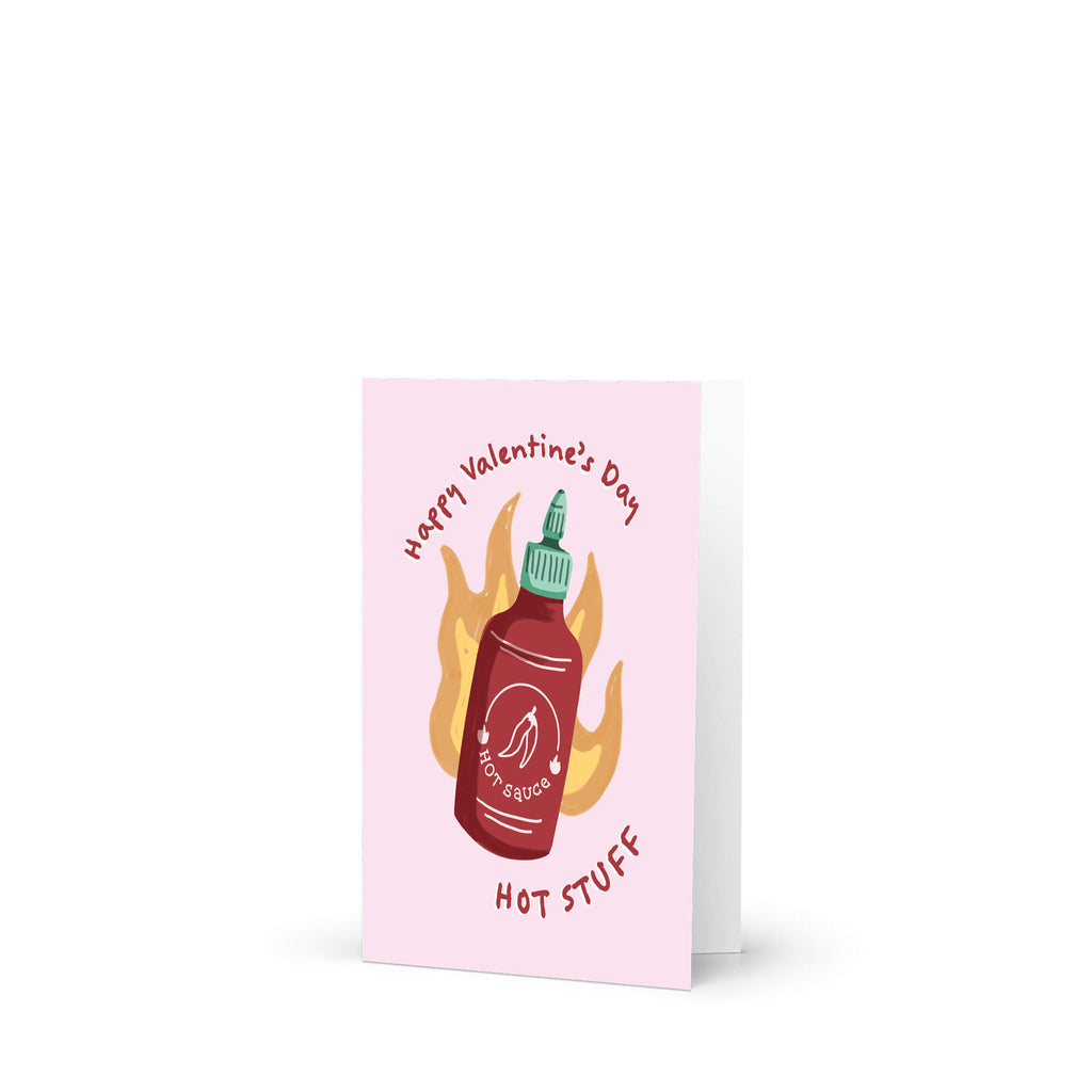 Red chili sauce bottle with flames; curved text “Happy Valentine’s Day — hot stuff.”