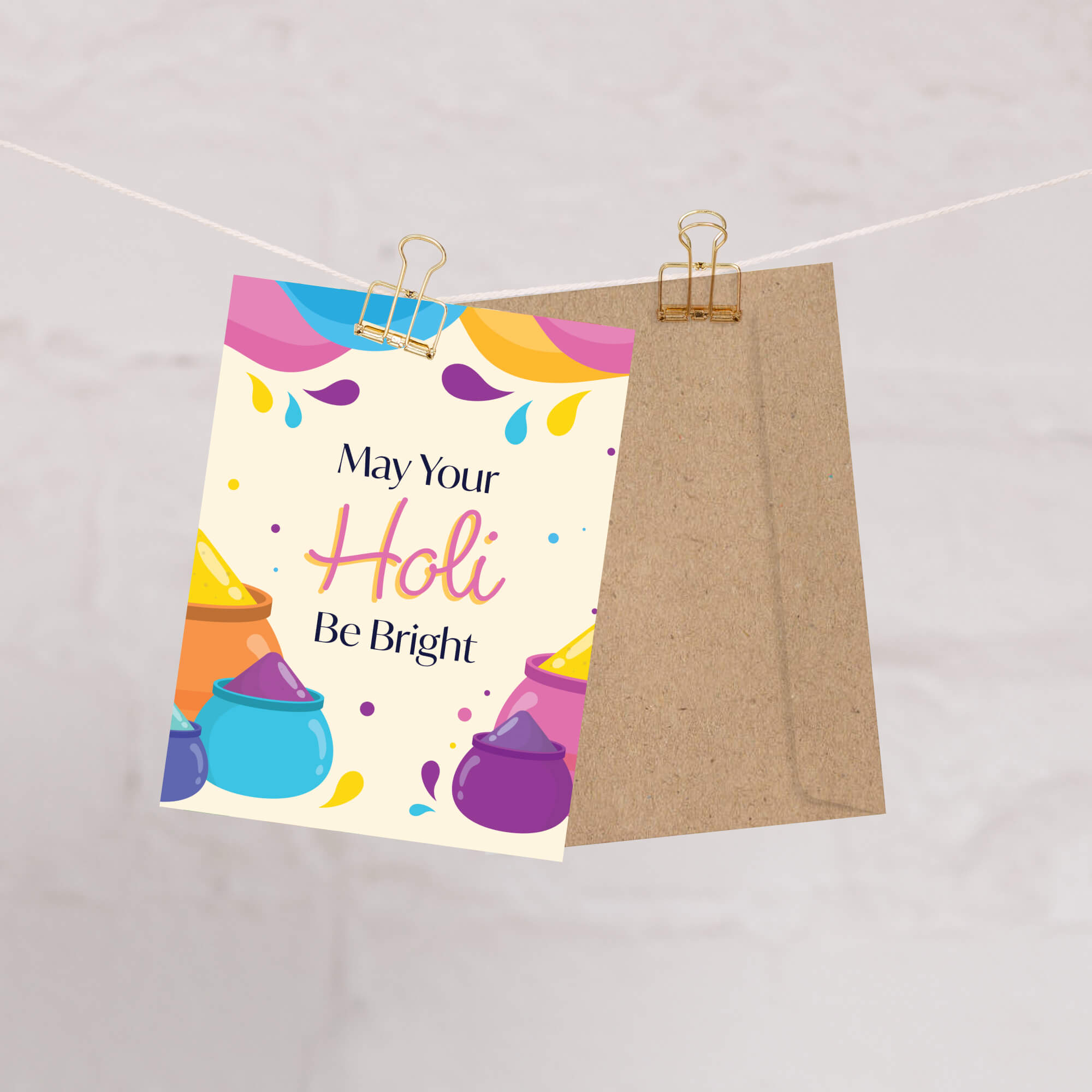 indian Greeting card with colorful Holi-themed design and text 'May Your Holi Be Bright' on a white background for  hindu festival of colors