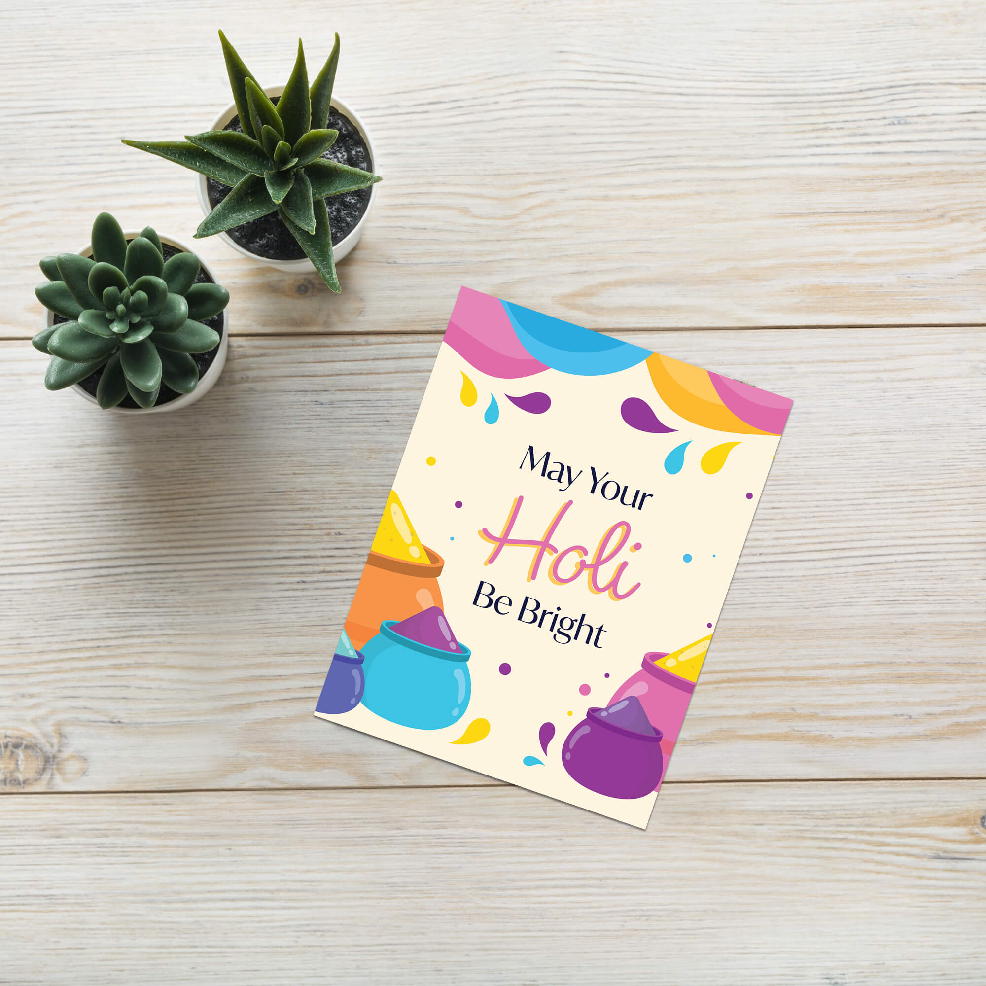 indian Greeting card with colorful Holi-themed design and text 'May Your Holi Be Bright' on a white background for  hindu festival of colors
