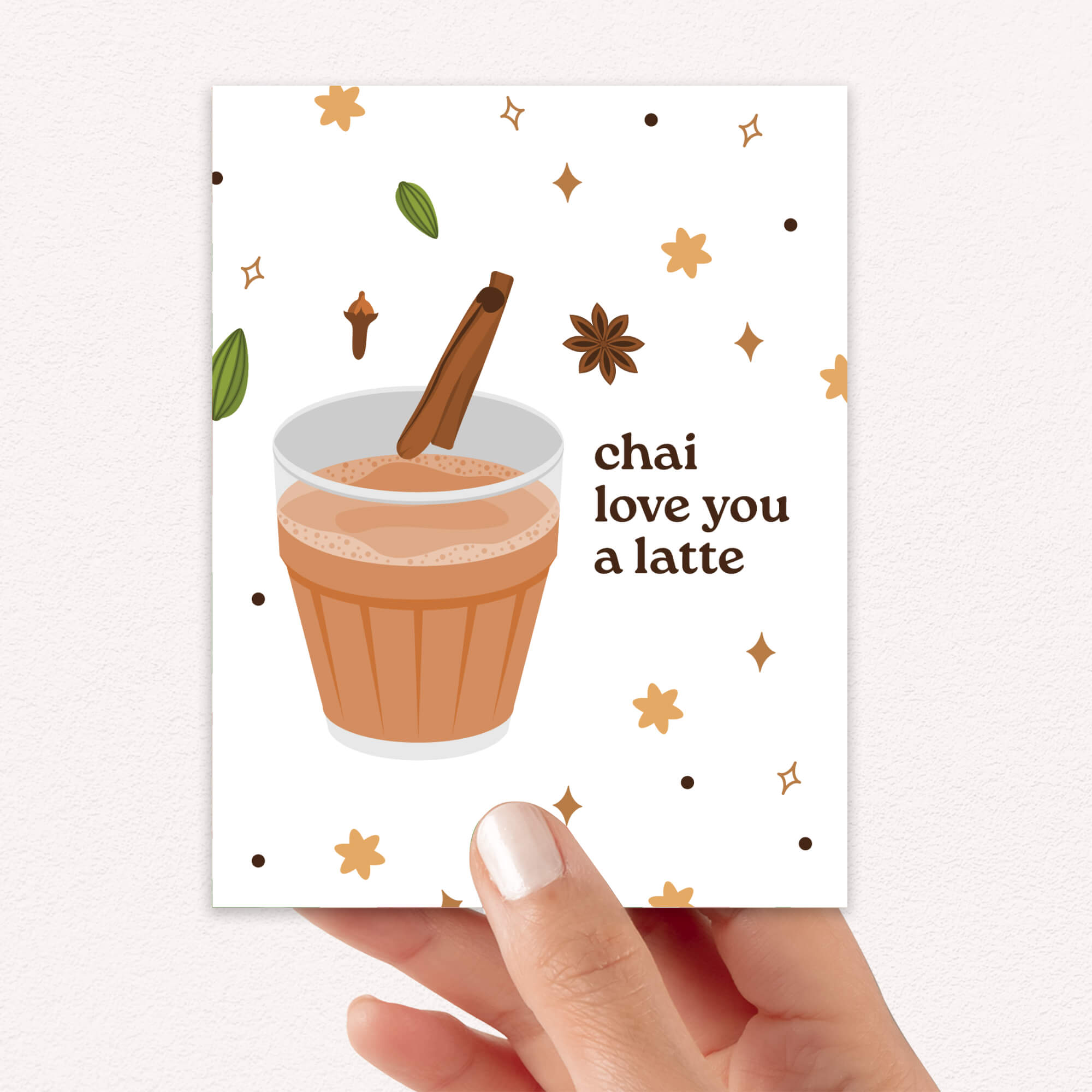 indian asian desi Greeting card with a cup of chai, cinnamon stick, and decorative elements on a white background.