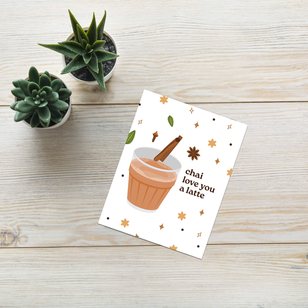 indian asian desi Greeting card with a cup of chai, cinnamon stick, and decorative elements on a white background.