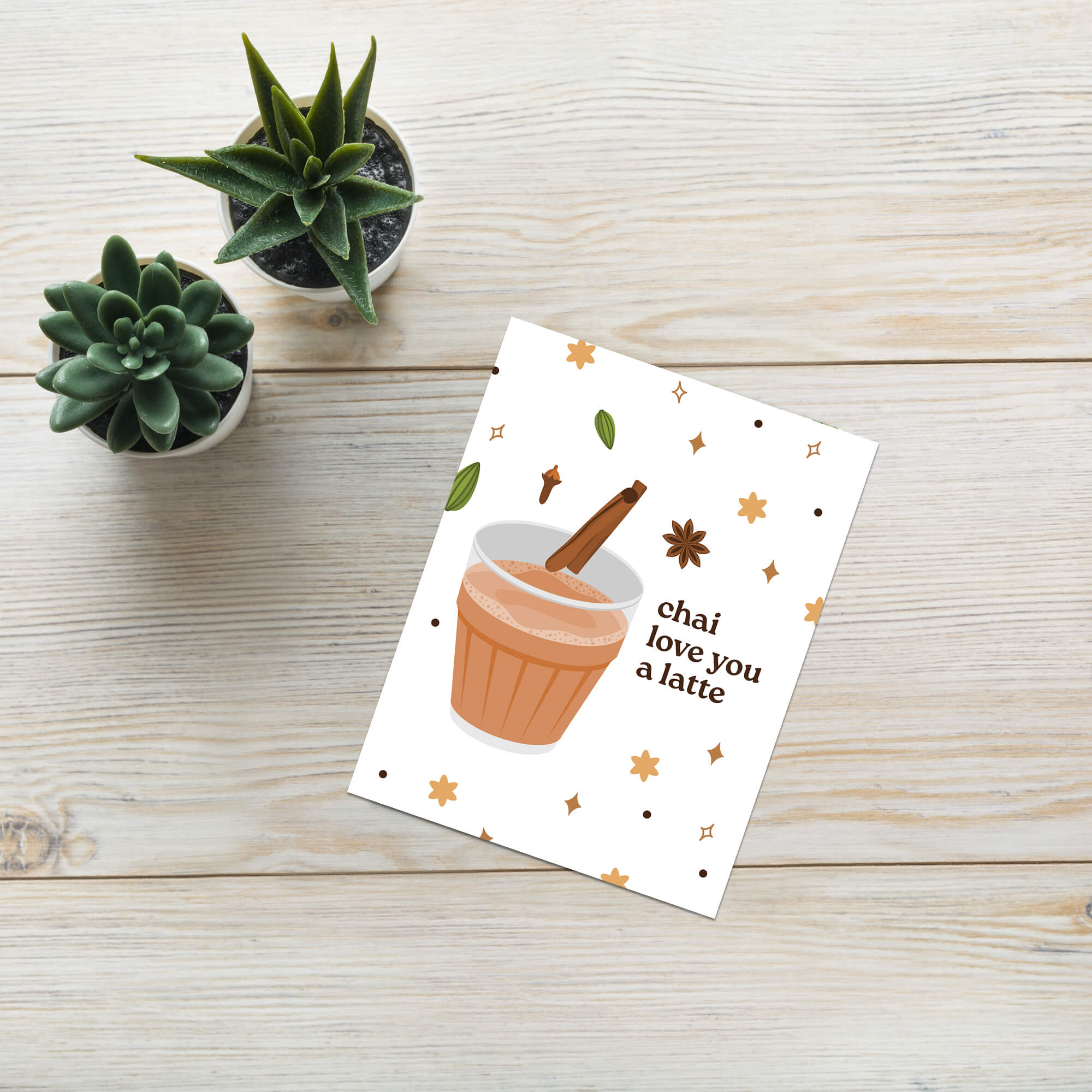 indian asian desi Greeting card with a cup of chai, cinnamon stick, and decorative elements on a white background.