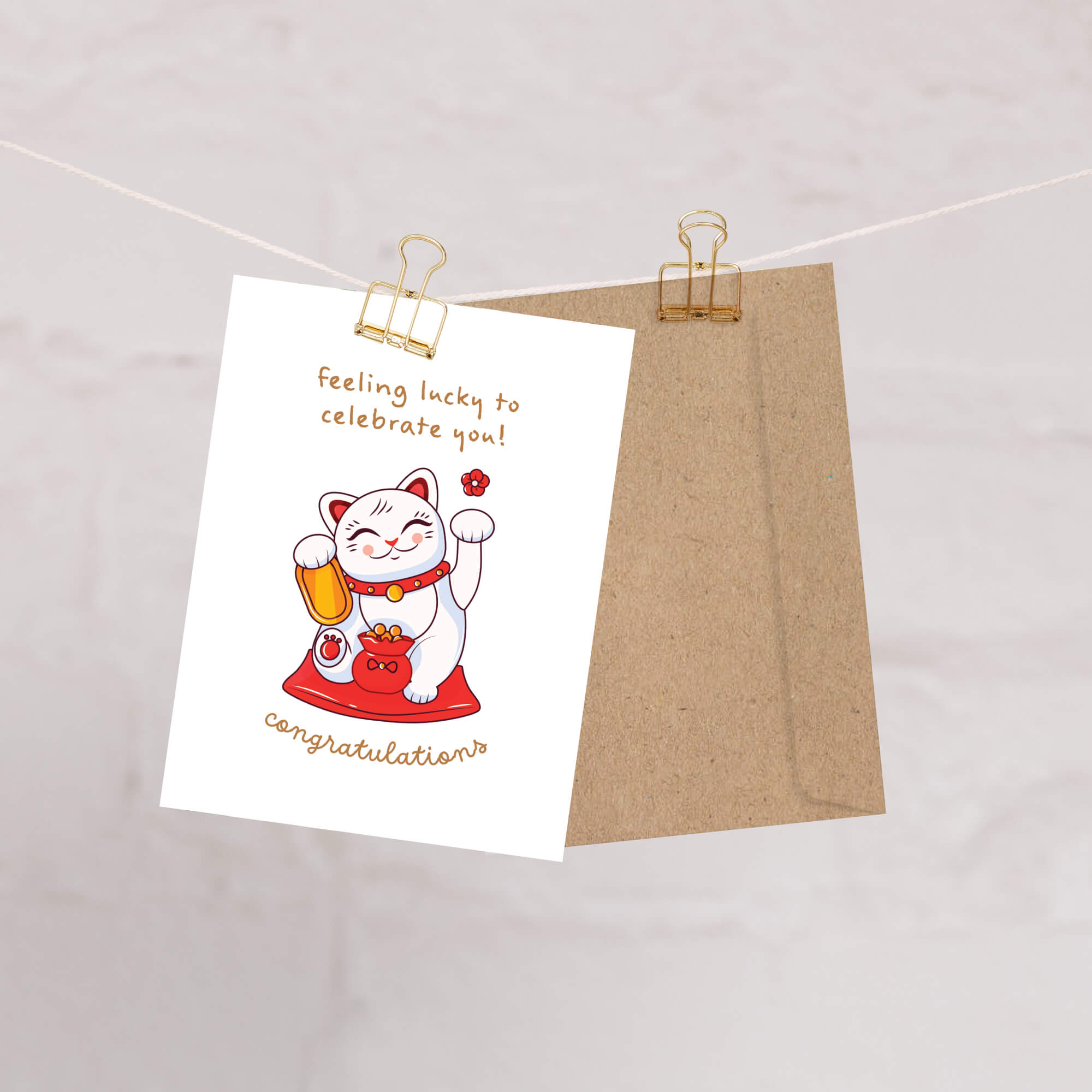 Greeting card with a japanese maneki neko cat illustration and text on a white background