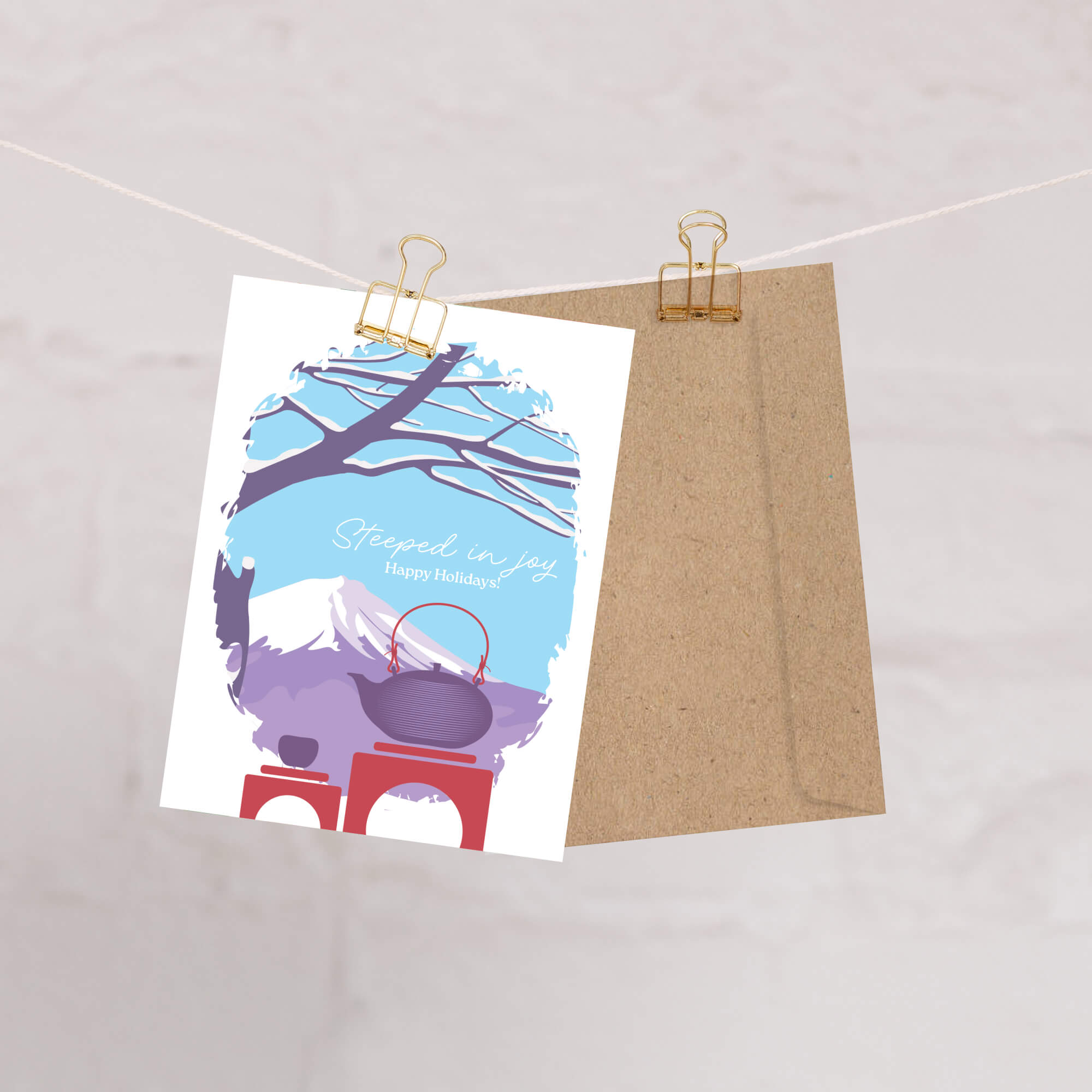 christmas Greeting card with japan's mount fuji winter scene, teapot, and 'Steeped in Joy Happy Holidays' text.