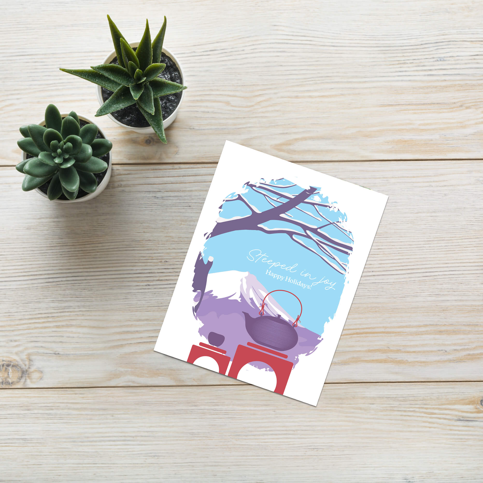 christmas Greeting card with japan's mount fuji winter scene, teapot, and 'Steeped in Joy Happy Holidays' text.