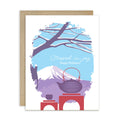 christmas Greeting card with japan's mount fuji winter scene, teapot, and 'Steeped in Joy Happy Holidays' text.
