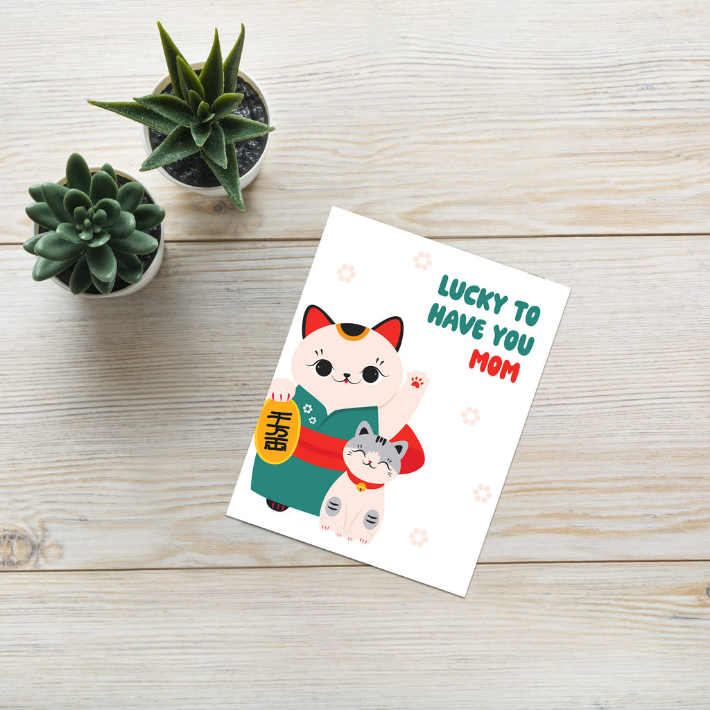 japanese Greeting card with 2 maneki neko lucky cats (mother and child) and text 'Lucky to have you mom' on a white background for a happy mother's day card
