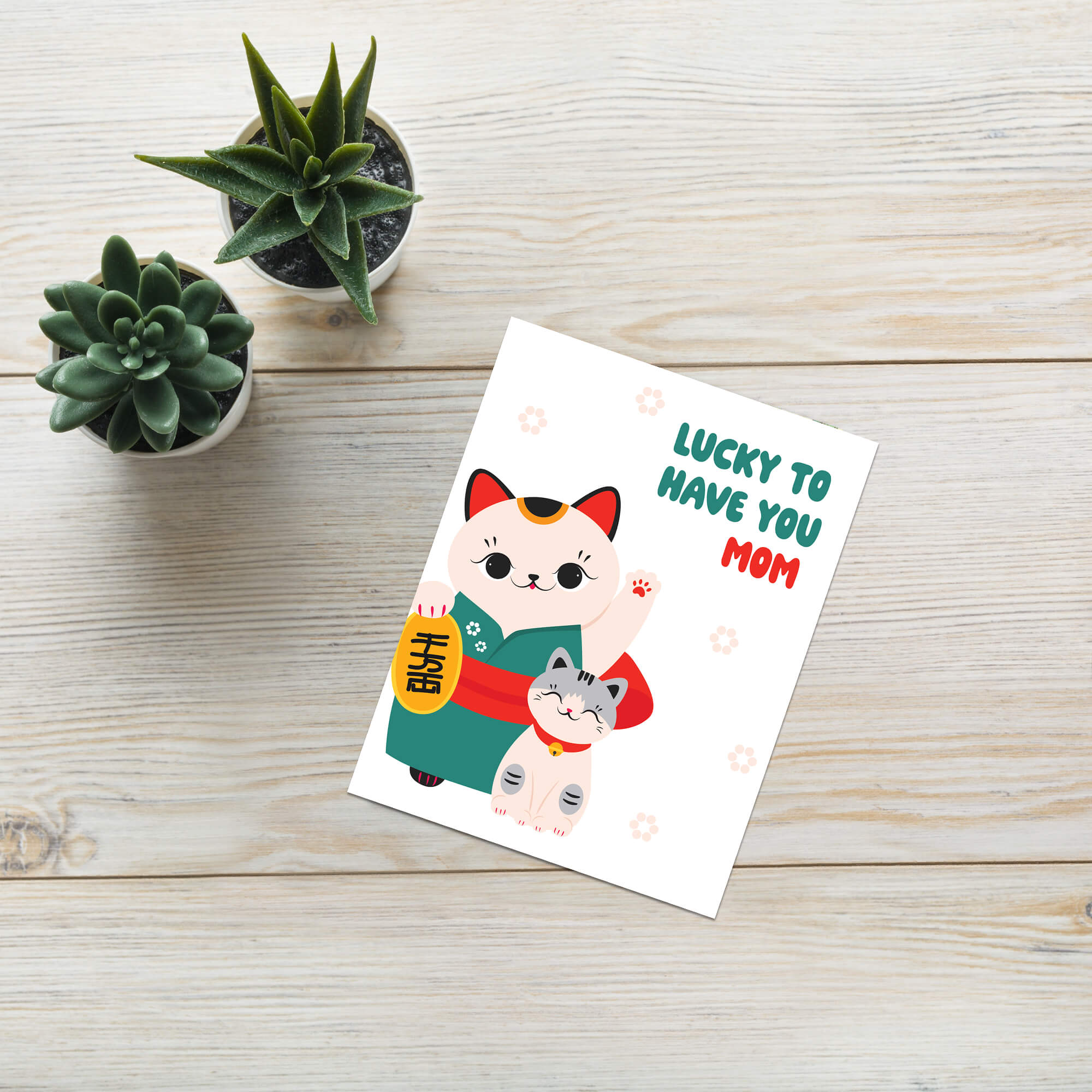 japanese Greeting card with 2 maneki neko lucky cats (mother and child) and text 'Lucky to have you mom' on a white background for a happy mother's day card