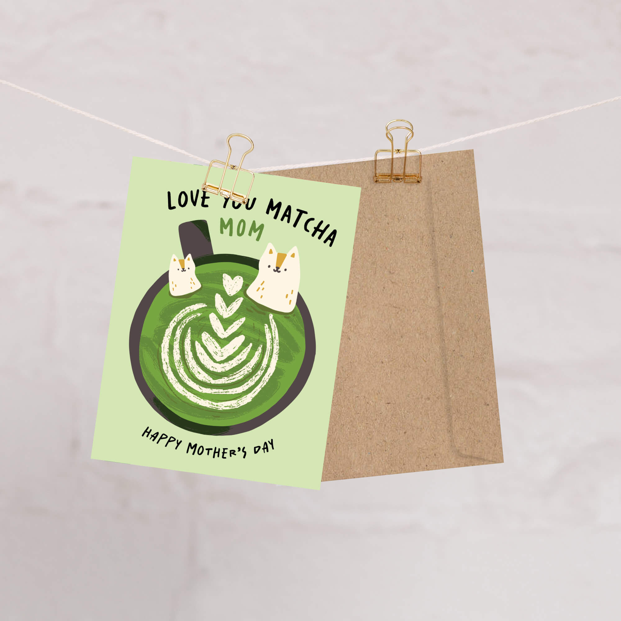 cute Mother's Day card with a green matcha latte design and text 'Love You Matcha Mom Happy Mother's Day' on a light green background and two cats in cup