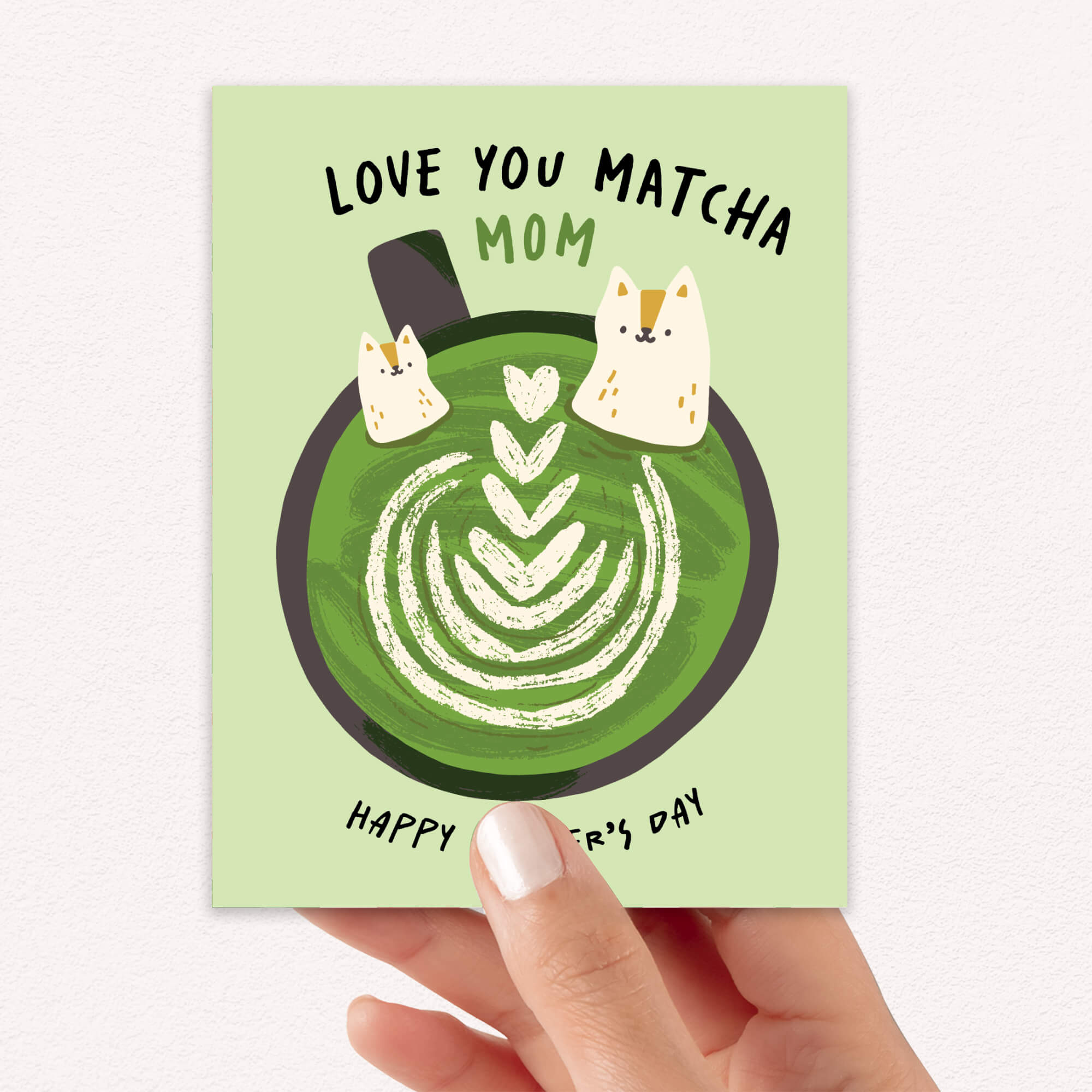 cute Mother's Day card with a green matcha latte design and text 'Love You Matcha Mom Happy Mother's Day' on a light green background and two cats in cup
