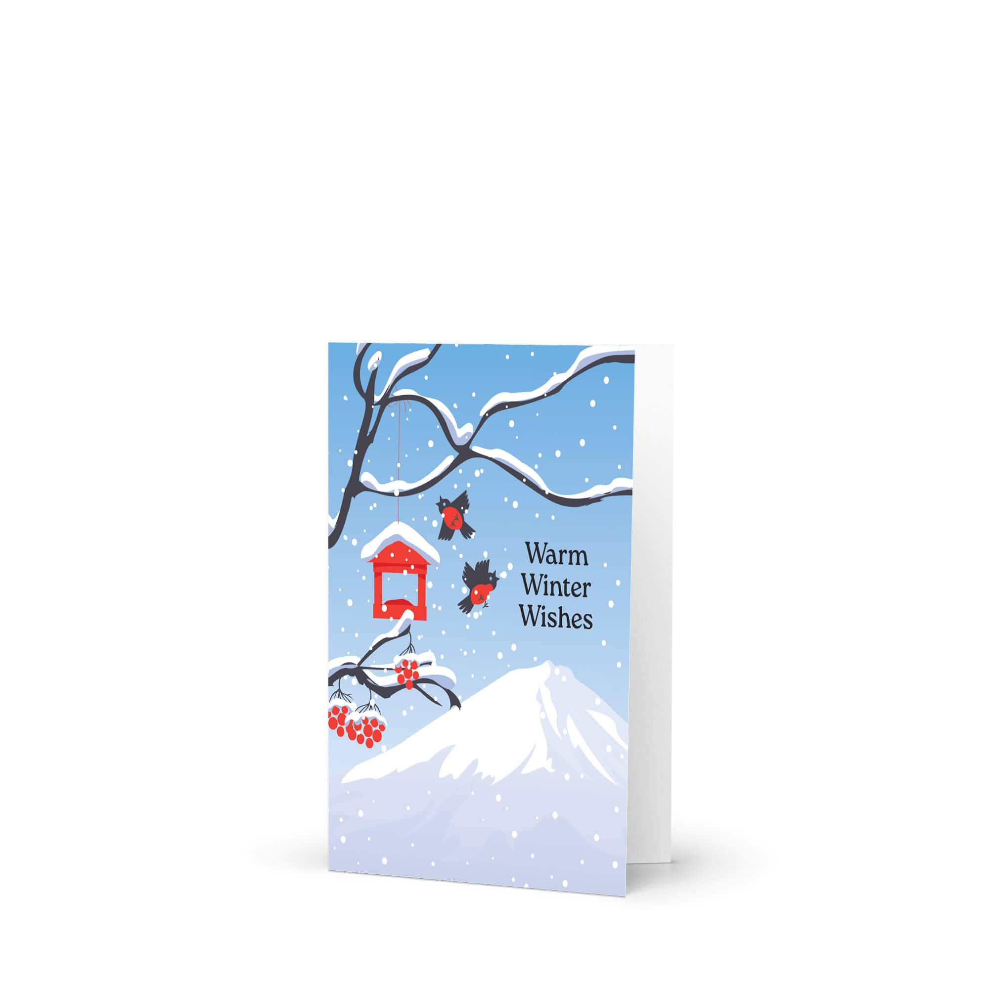 unique japanese christmas card. Snow-covered tree branches with red berries, birds, a red birdhouse, and Mt. Fuji. Text reads “Warm Winter Wishes.”