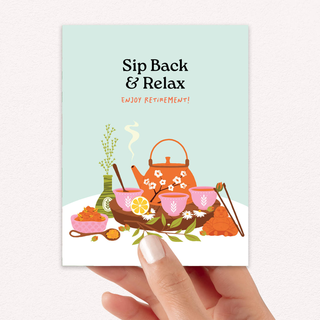 Greeting card with teapot illustration and 'Sip Back & Relax' text on a light blue background.