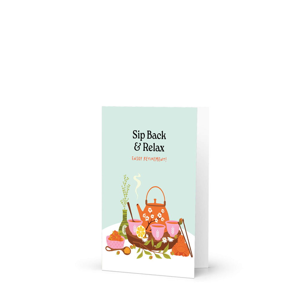 Greeting card with illustration of a teapot and flowers and text 'Sip Back & Relax' on a light blue background.