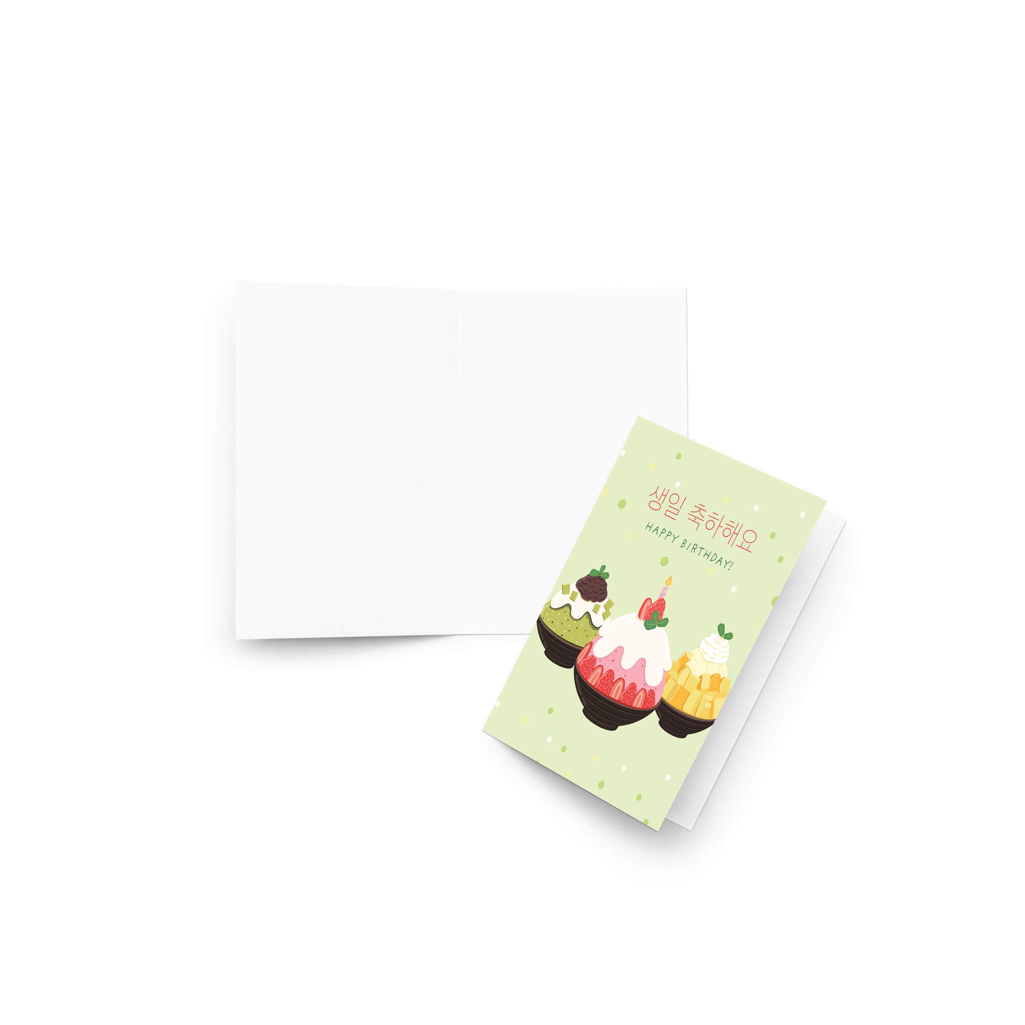 A folded Korean birthday card with a light green cover featuring cute illustrated desserts and Korean text, shown next to an open blank white card on a clean white background.