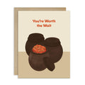 Greeting card with two traditional korean fermenting pots and a kimchi cabbage inside, text 'You're Worth the Wait' on a beige background.