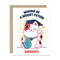 cute graduation card with a japanese lucky cat in a graduation cap and tassel, text 'Waving in a Bright Future' and 'Congrats!' on a white background.