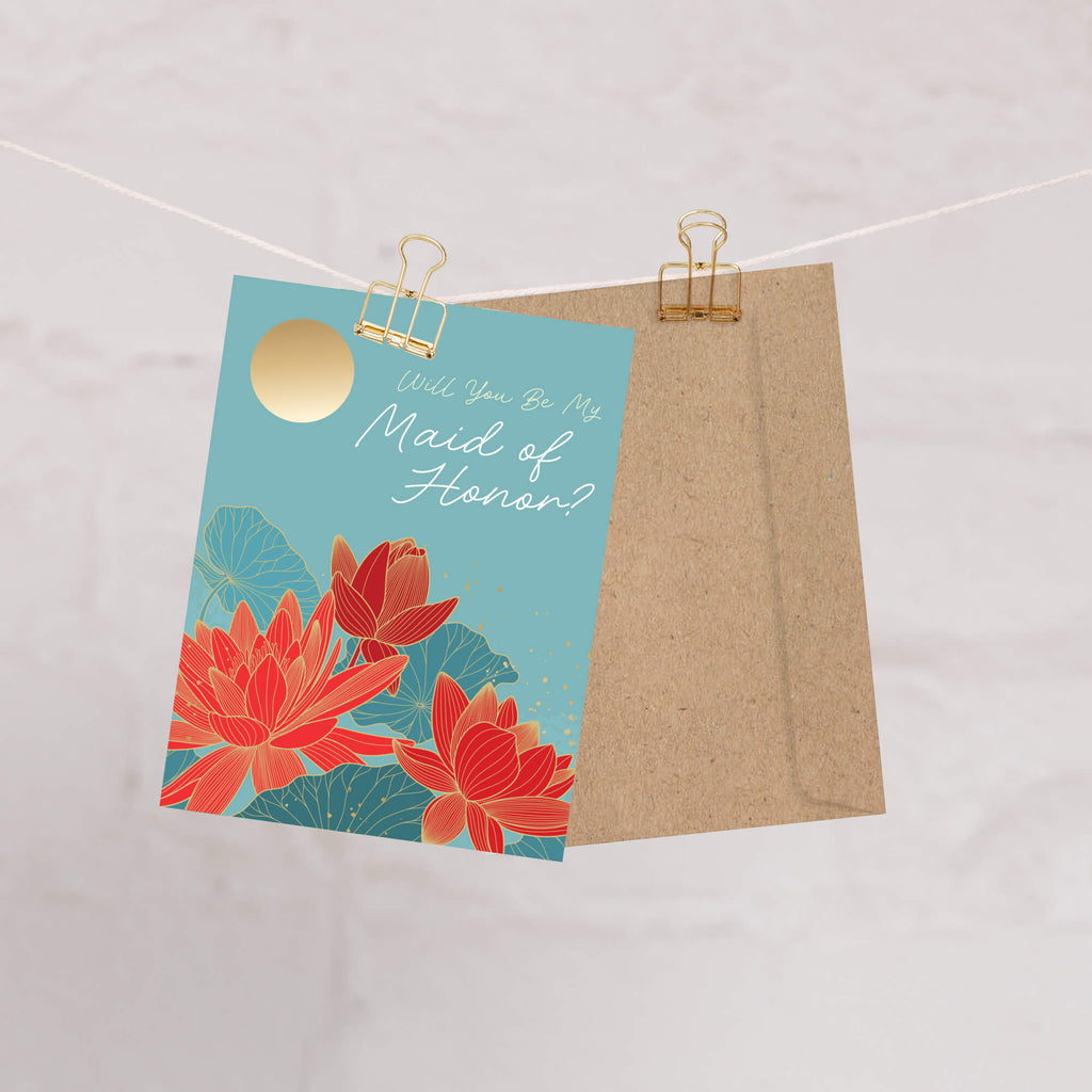 Floral card with 'Will You Be My Maid of Honor?' text on a light background