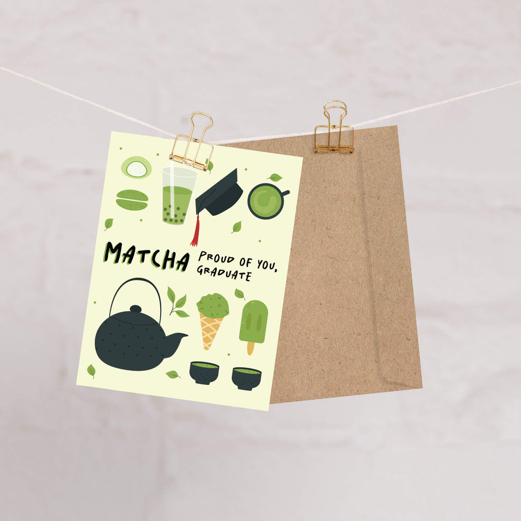 graduation card with japanese matcha green tea illustrations and text 'Matcha Proud of You, Graduate' on a light yellow background.