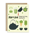 graduation card with japanese matcha green tea illustrations and text 'Matcha Proud of You, Graduate' on a light yellow background.