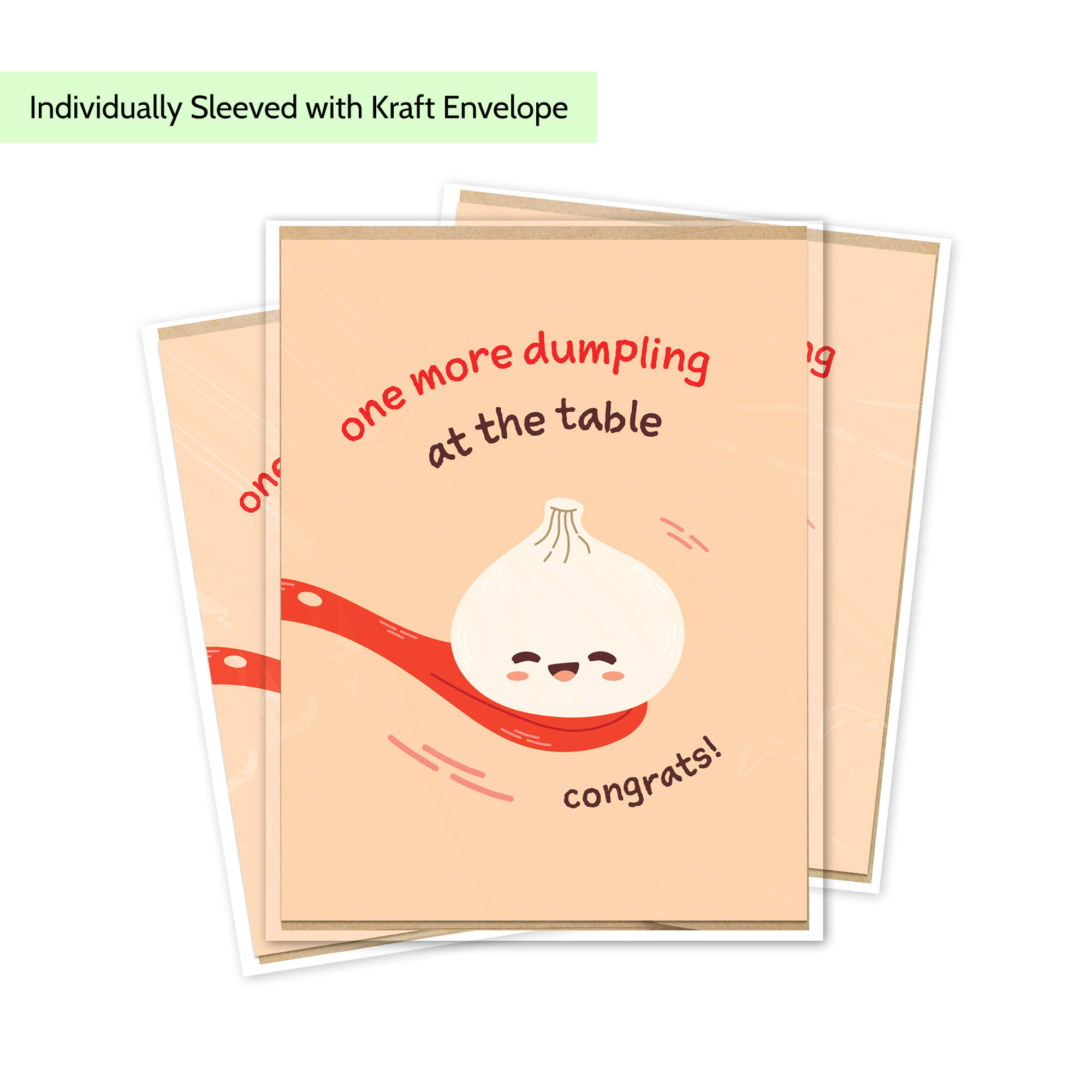 A stack of cute dumpling-themed baby greeting cards with kraft envelopes, featuring a smiling cartoon dumpling on a red spoon and the text 'one more dumpling at the table' and 'congrats!'.
