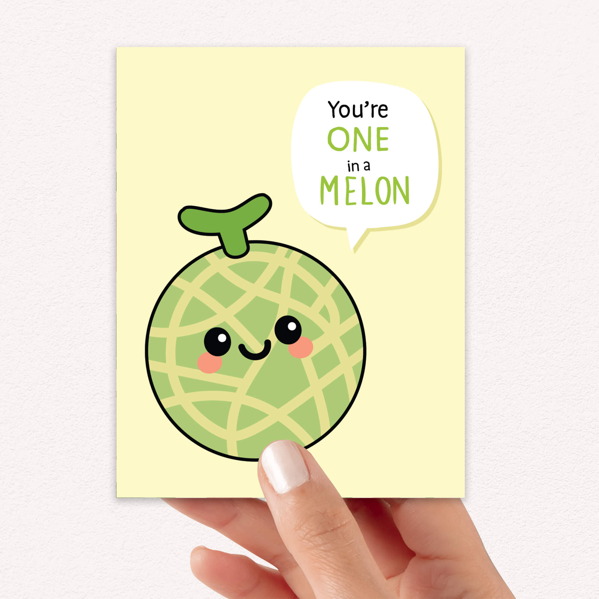 Card with a cartoon cantaloupe fruit and 'You're one in a melon' text on a light yellow background.