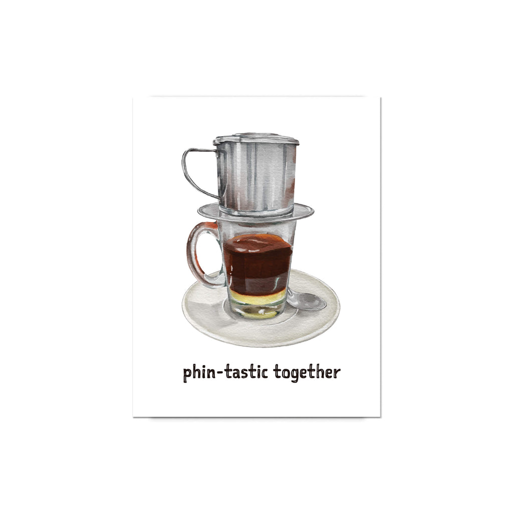 Glass coffee cup with vietnamese cafe filter and saucer on a white background with 'phin-tastic together' text.