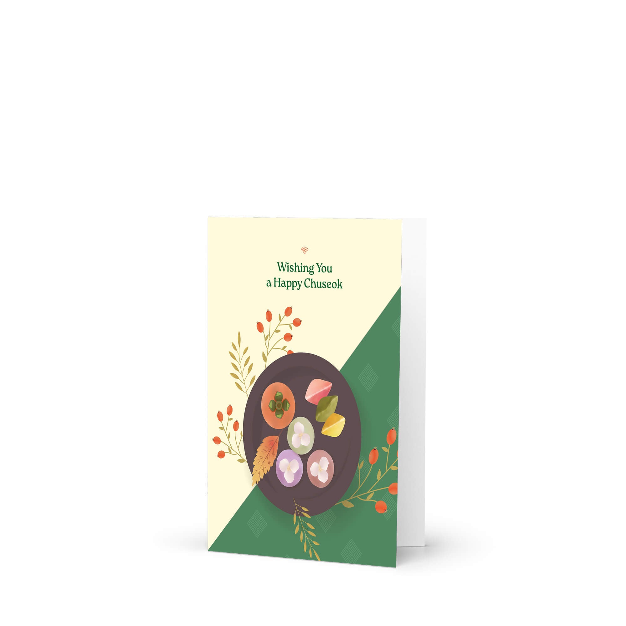 korean Greeting card with a plate of traditional Korean dishes Persimmon, Songpyeon & Hangwa for mid autumn festival  on a green and beige background.