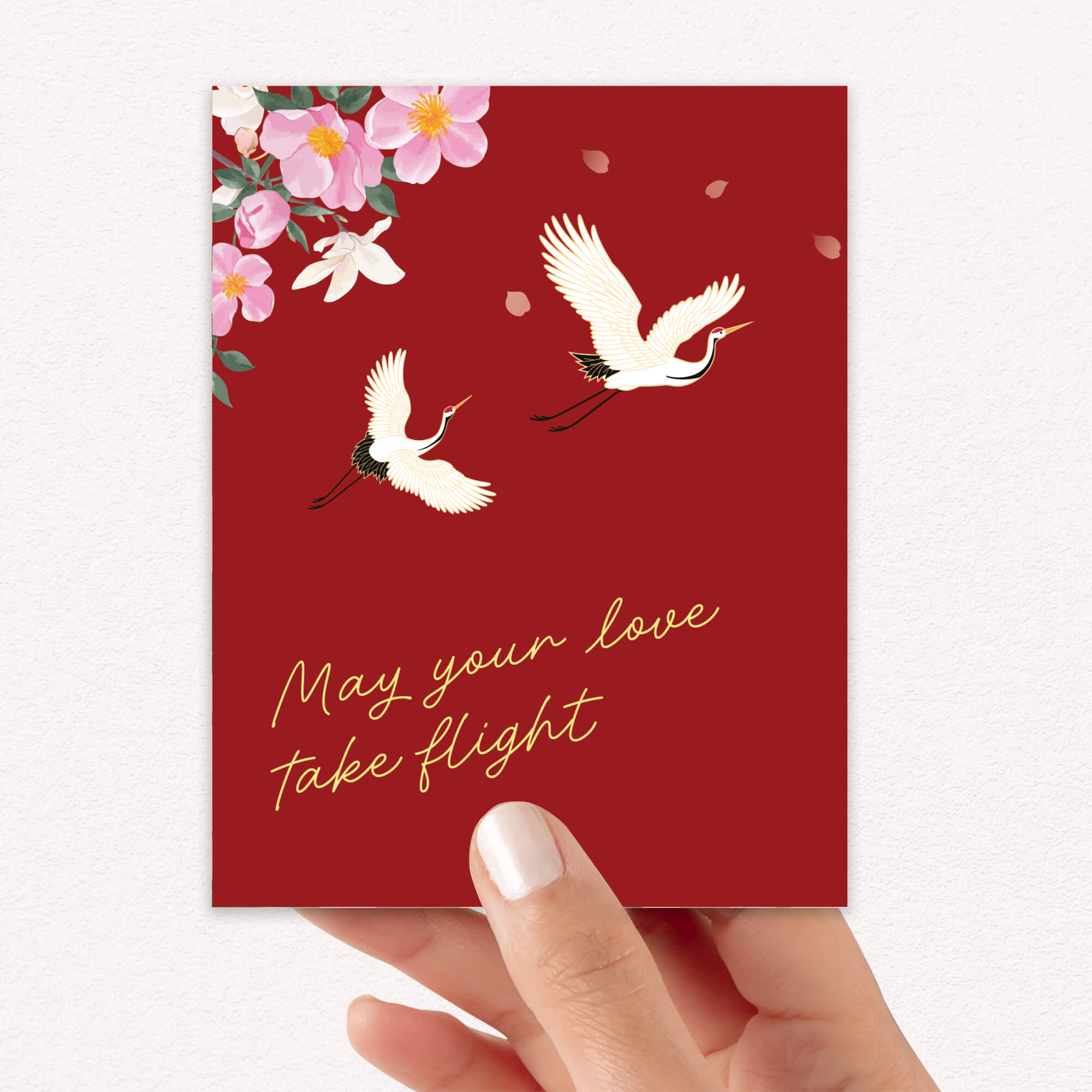 Red wedding chinese vietnamese card with white cranes, pink flowers, and 'May your love take flight' text on a white background