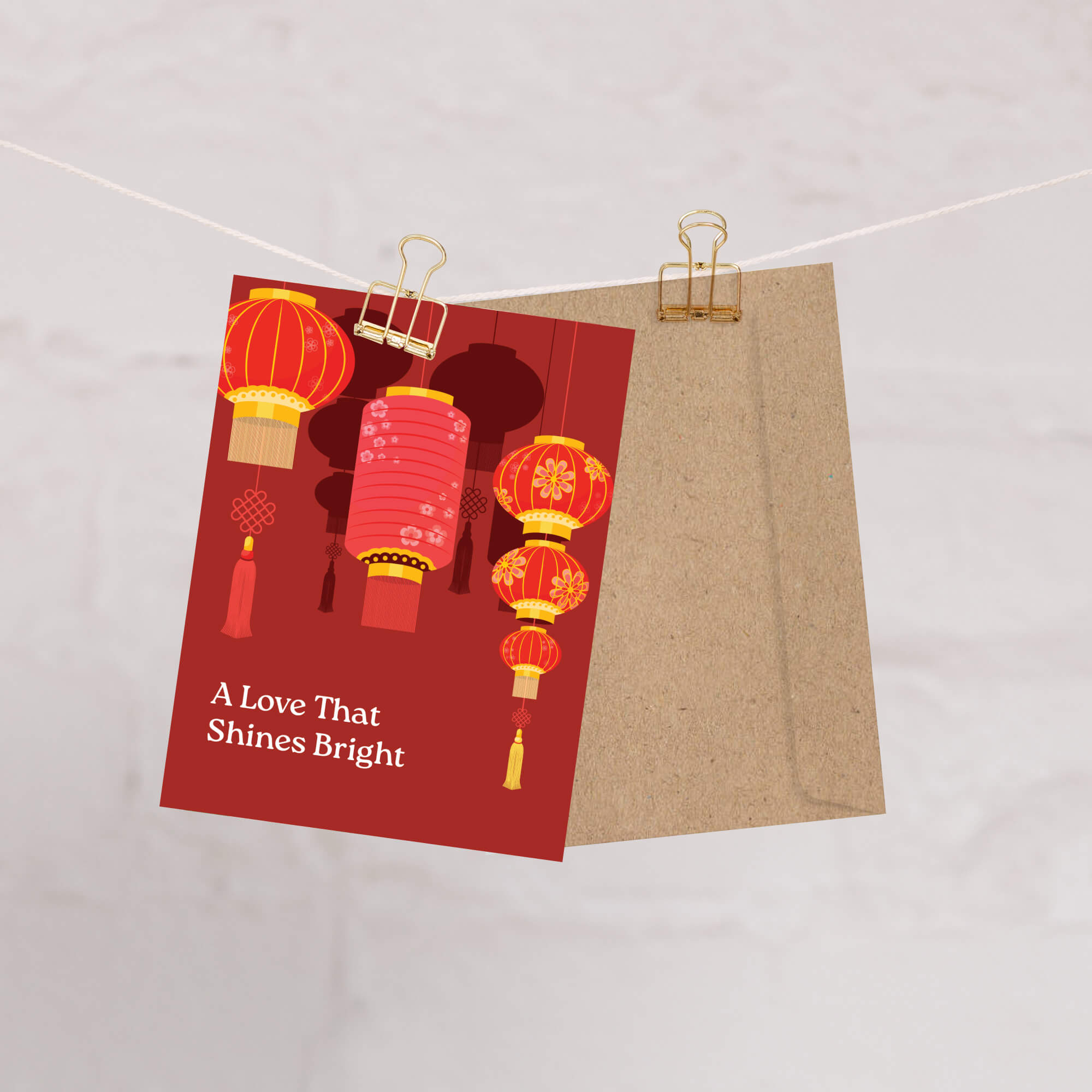 chinese wedding Greeting card with red lanterns and text 'A Love That Shines Bright' on a red background