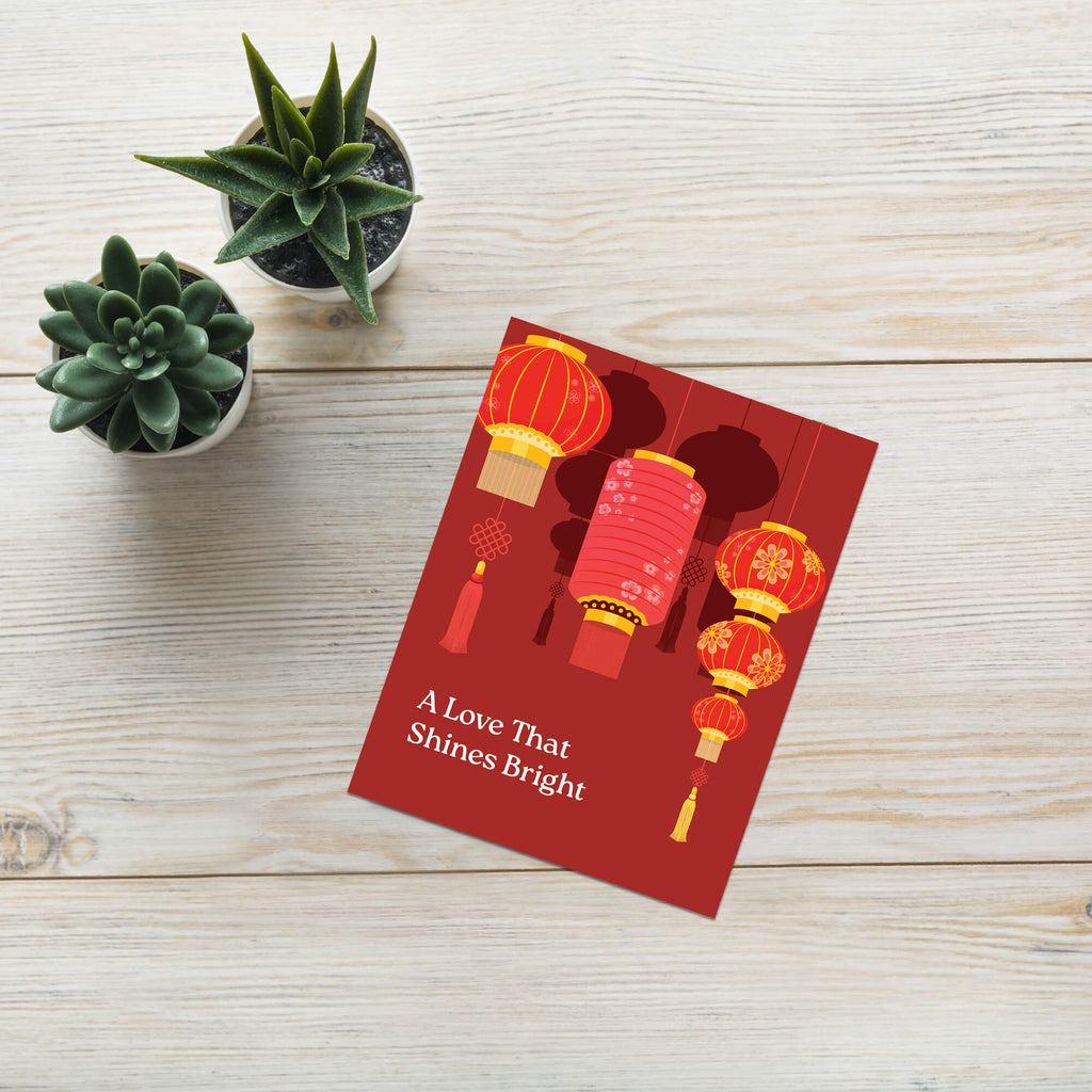 chinese wedding Greeting card with red lanterns and text 'A Love That Shines Bright' on a red background