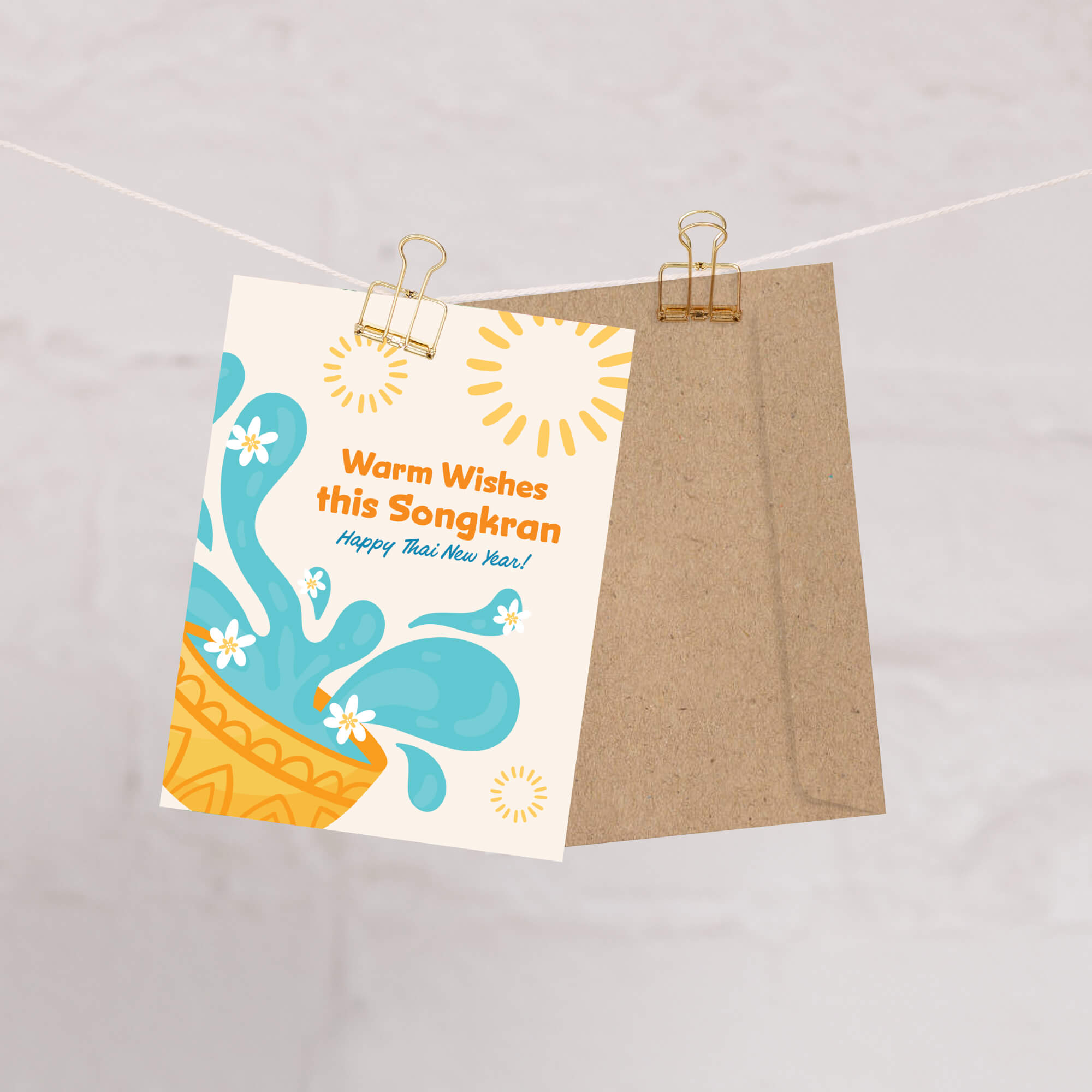 thai new year Greeting card with water splashes and text for Songkran celebration on a white background