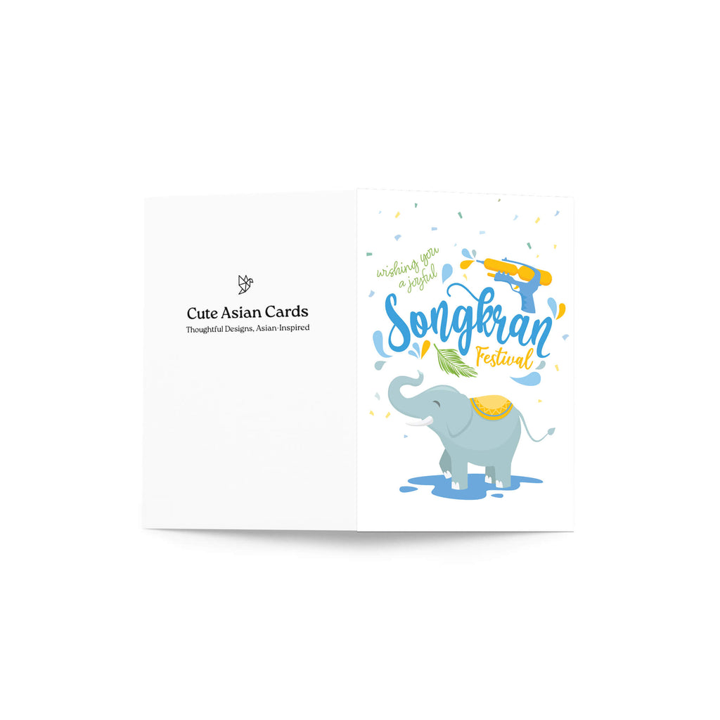 thai new year Greeting card with an elephant and Songkran Festival text on a white background