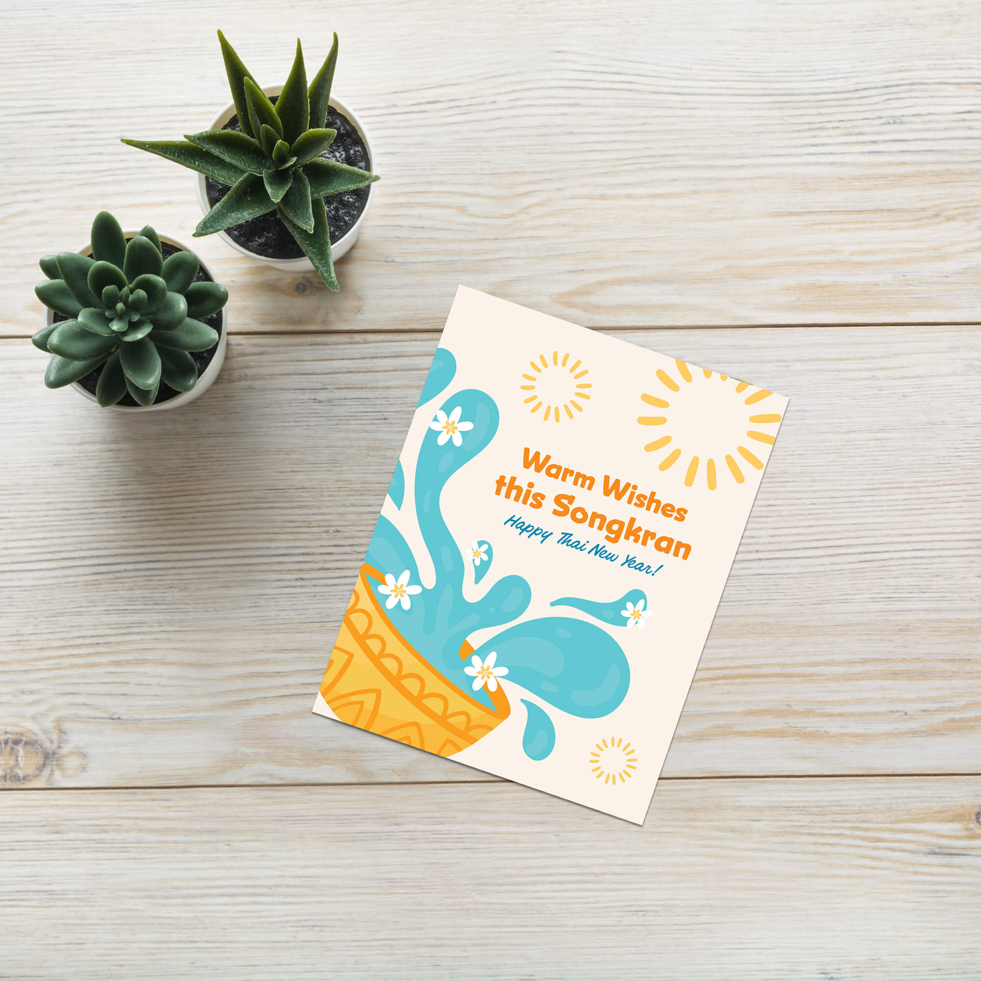 thai new year Greeting card with water splashes and text for Songkran celebration on a white background