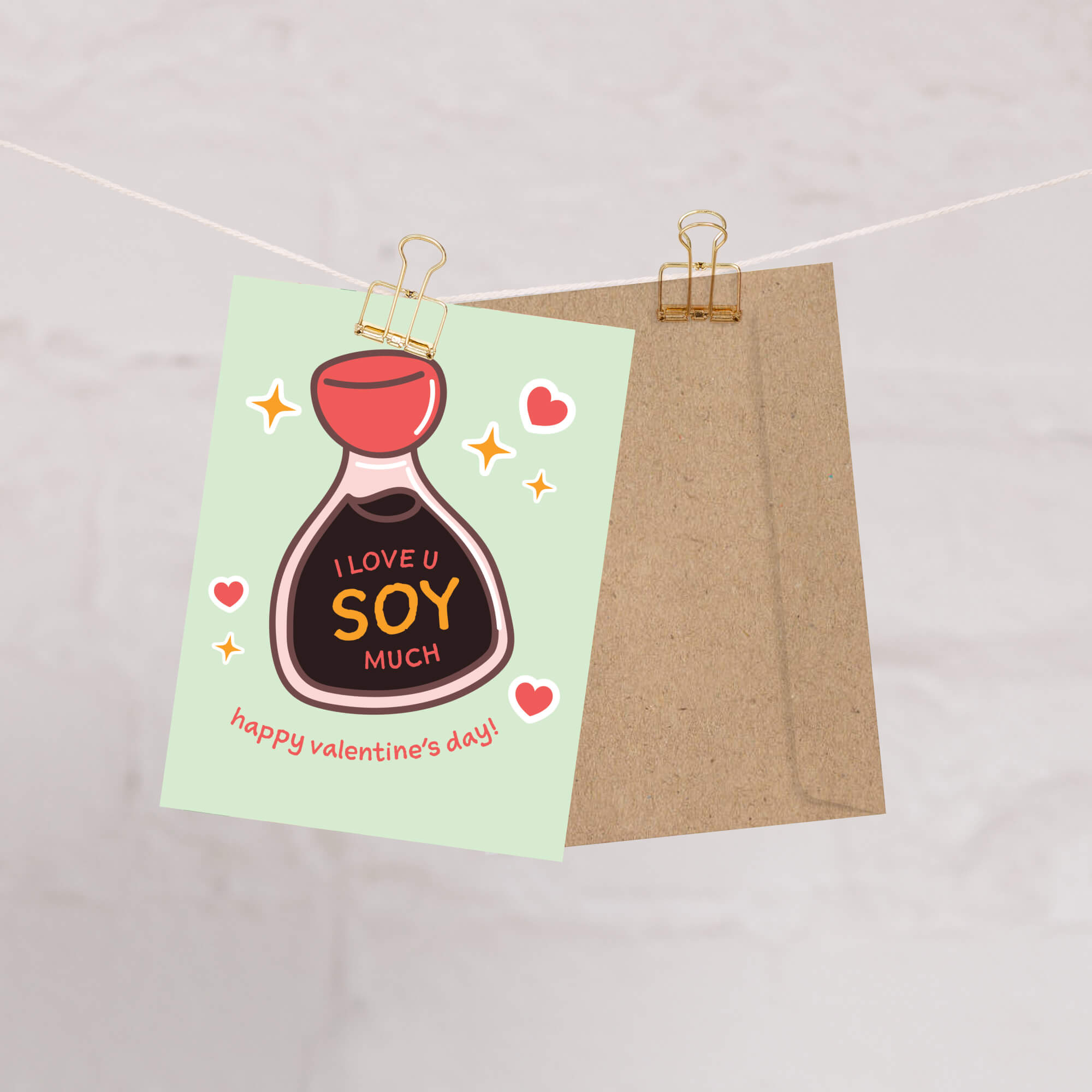 Smiling soy sauce bottle on mint with hearts; label says “I love u soy much.”
