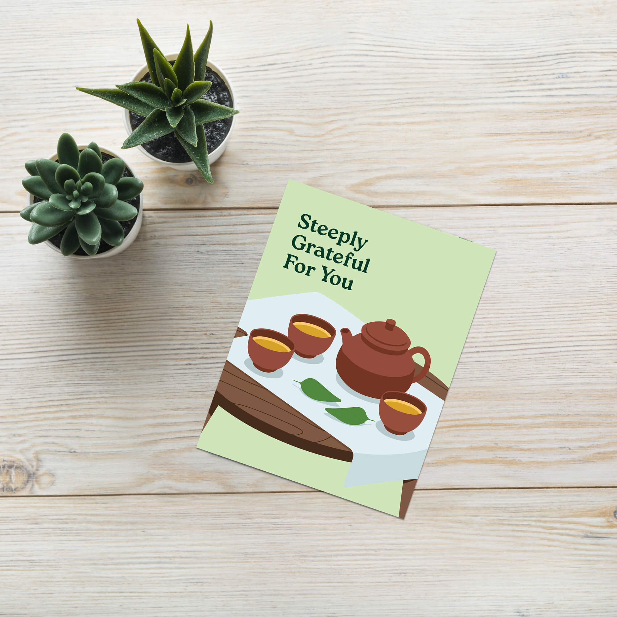 asian Greeting card with a chinese teapot and cups illustration and 'Steeply Grateful For You' text.