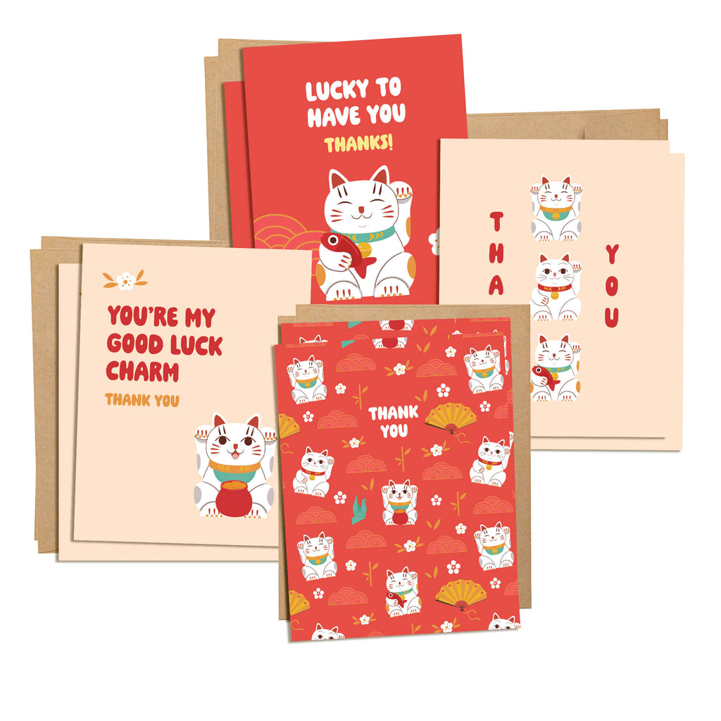 Set of greeting cards with lucky cat designs on a white background