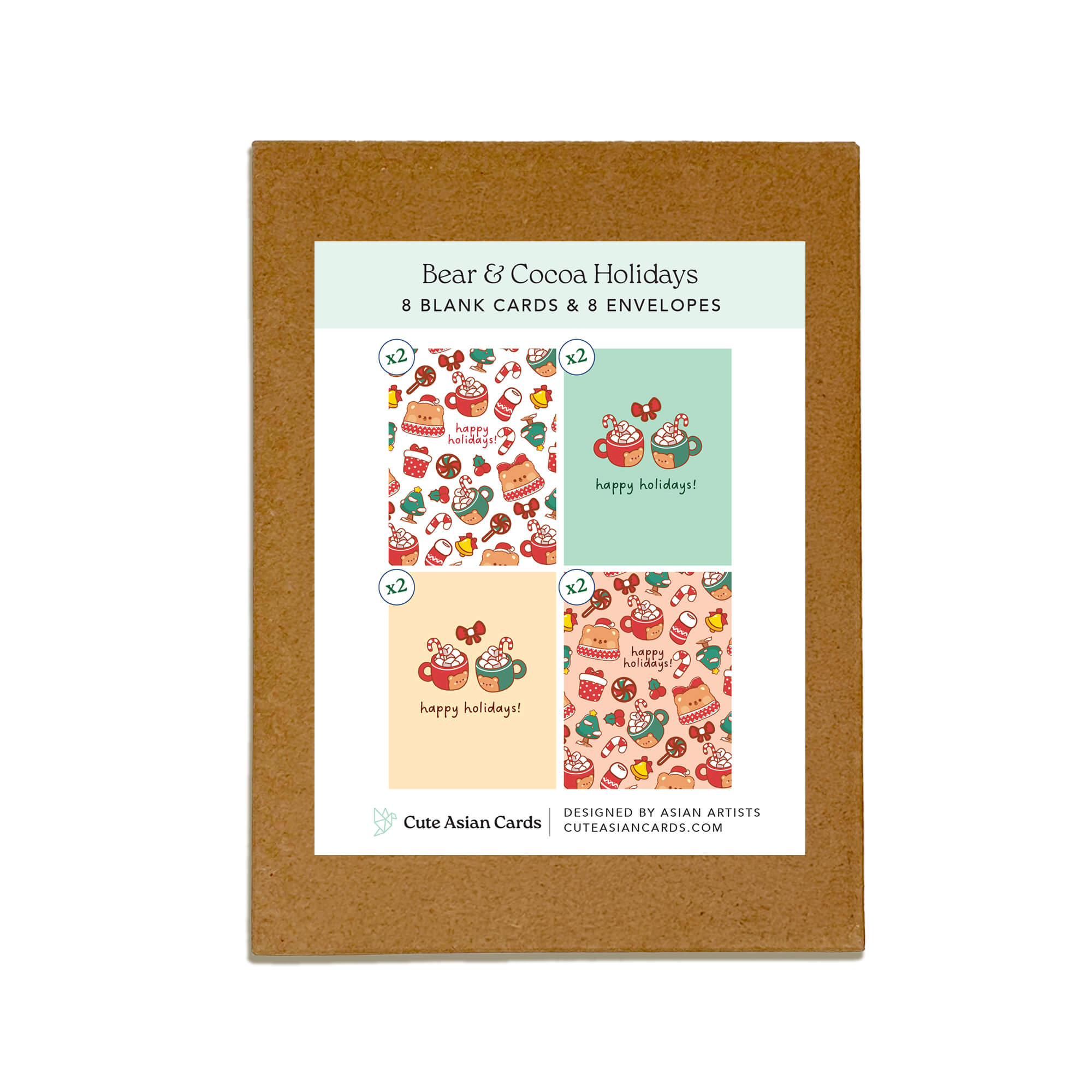Bear & Cocoa holiday card pack showing 4 warm and festive designs featuring mugs of hot chocolate with bear faces, candy canes, and holiday treats. Each design appears twice for a total of 8 cards with kraft envelopes.