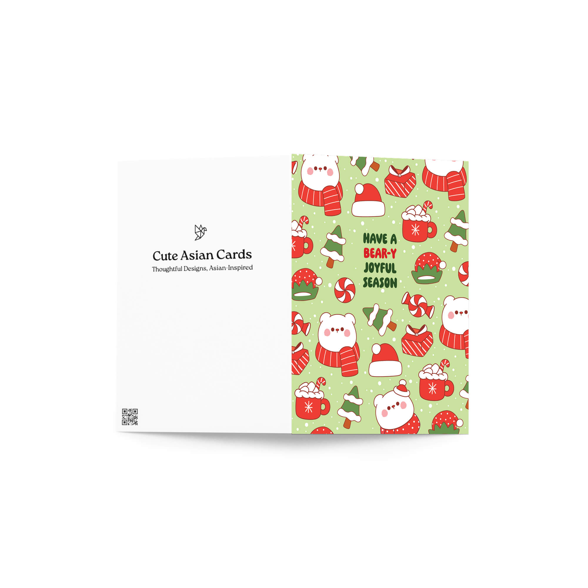 unique Christmas card with white polar bear in red scarf and santa hat and holiday elements on a green background with text "have a bear-y joyful season"